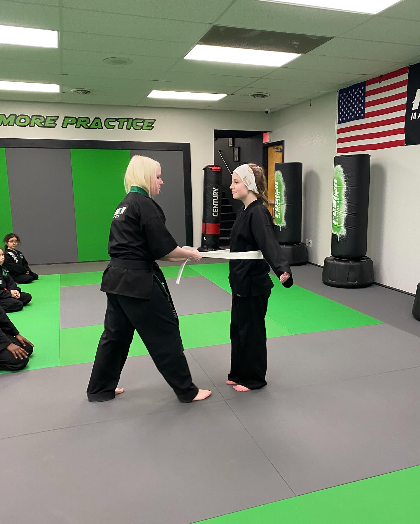 Student demonstrating skills at belt testing
