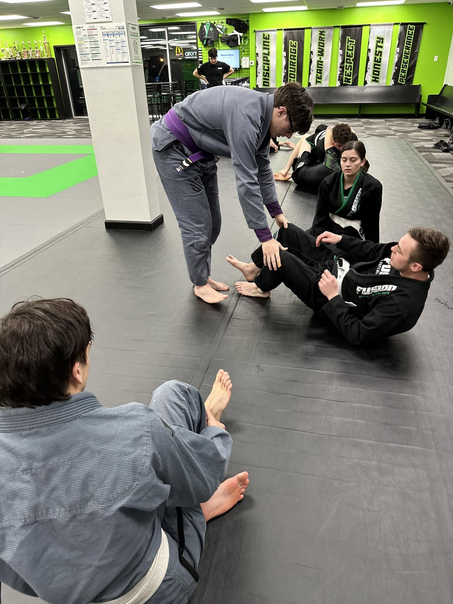 Adult jiu jitsu class demonstration at Fusion