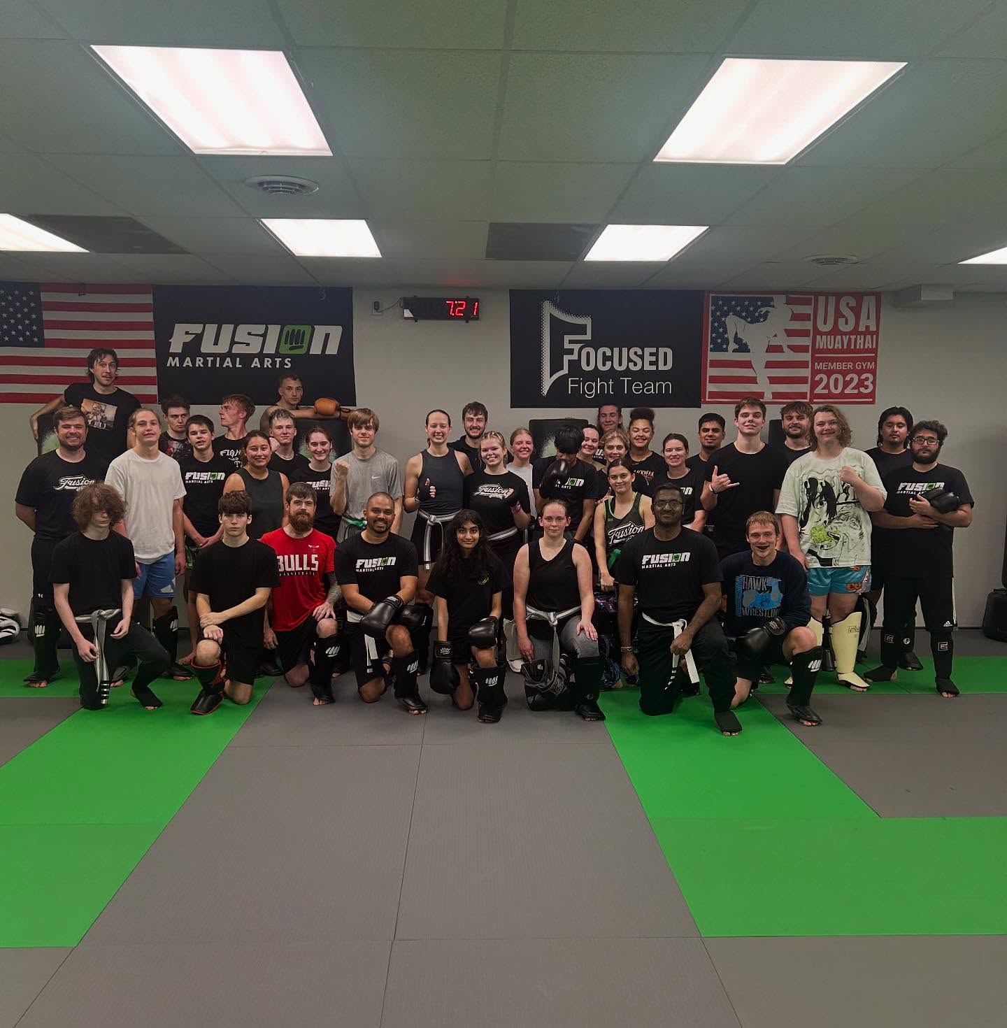 Adult Muay Thai class group at Fusion