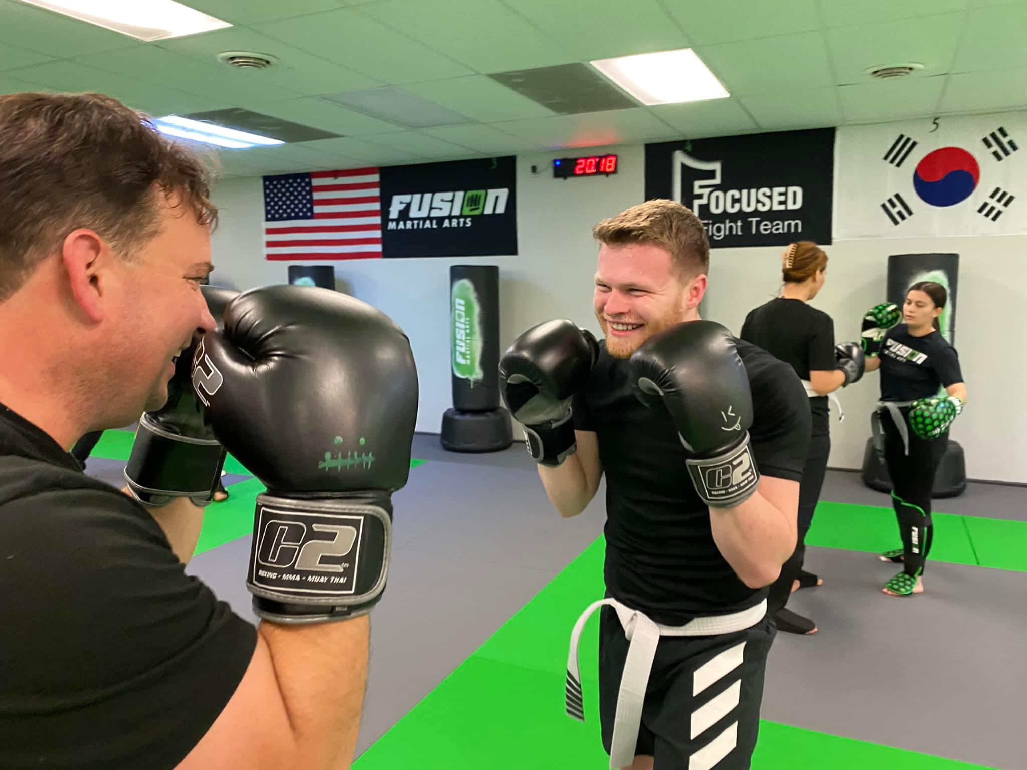 Adult Muay Thai partner sparring at Fusion
