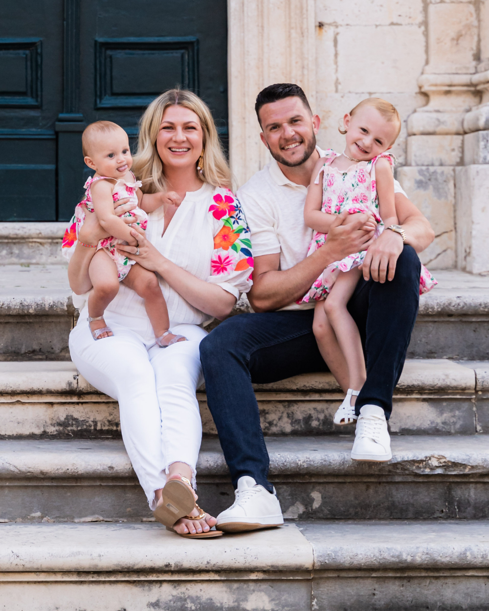 Coach Jonathan with his wife and daughters