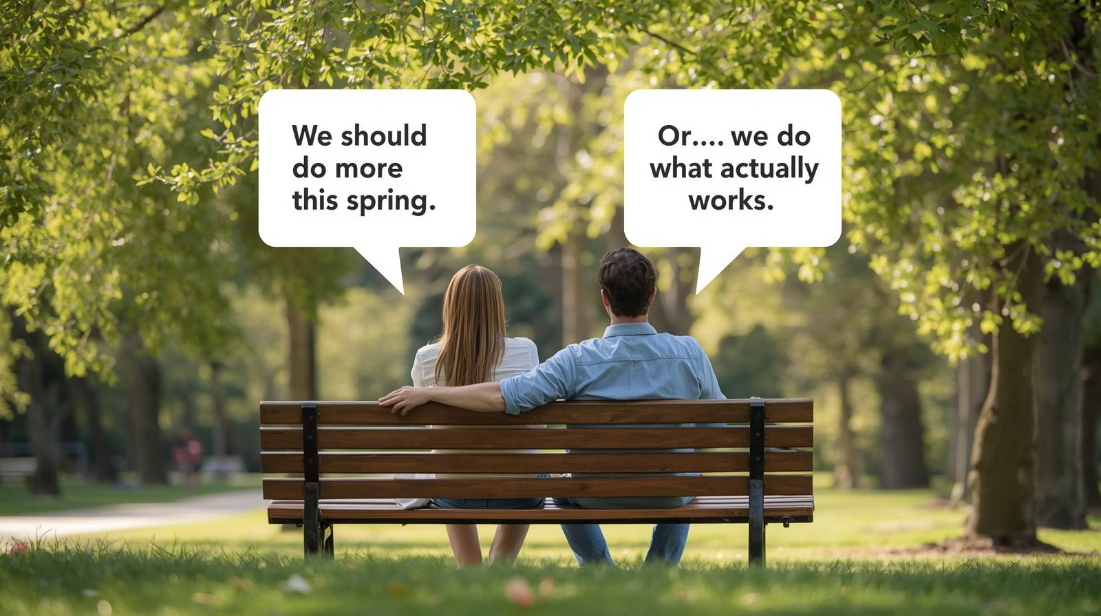 A mom and dad sitting on a park bench on a sunny spring day. A mom and dad sitting on a park bench on a sunny spring day.