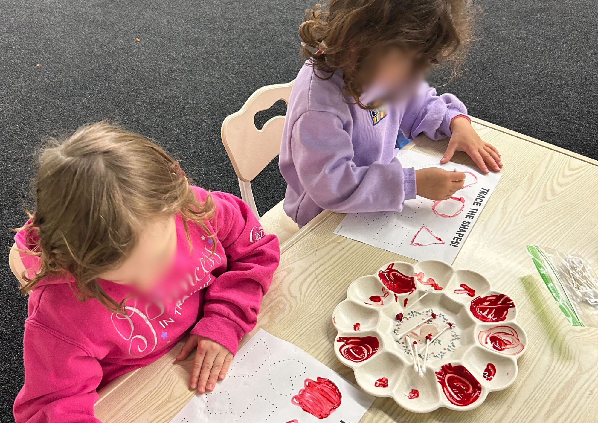 Kids focused on an activity. 