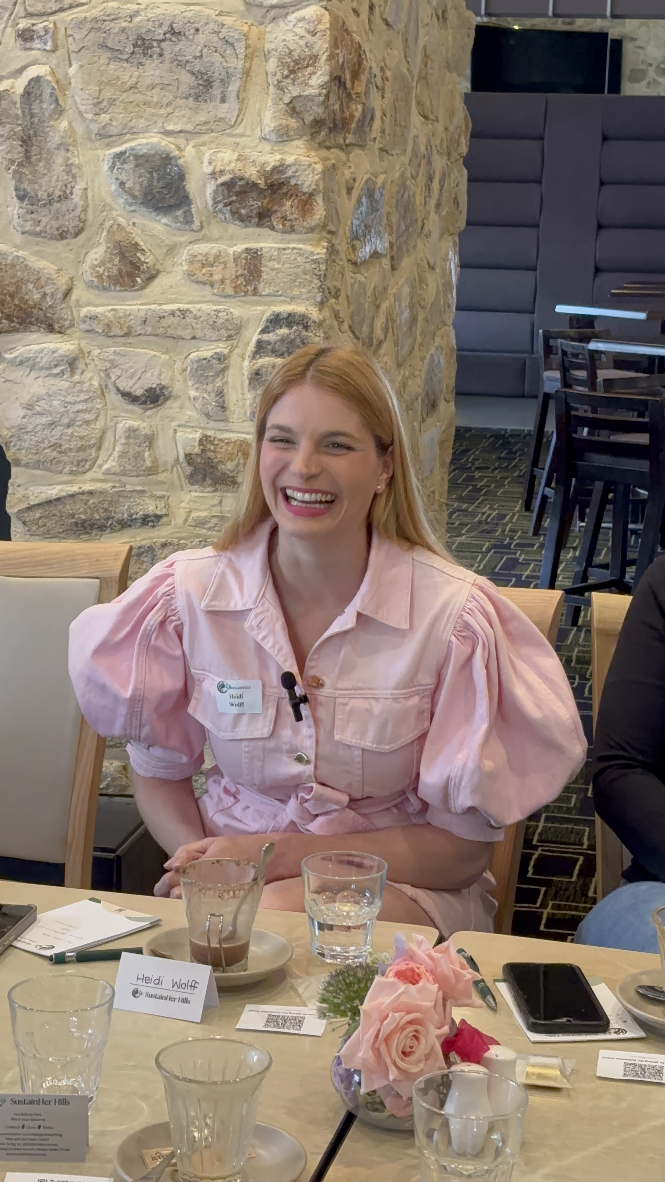 A guest speaker sharing her story at a SustainHer Connect event.