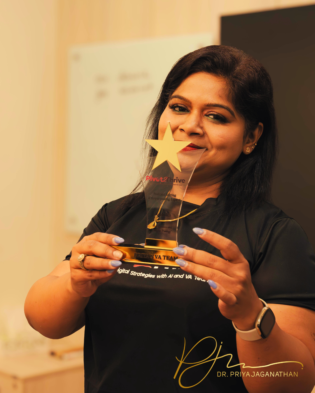 Dr. Priya Jaganathan holding the 2025 for Focus award