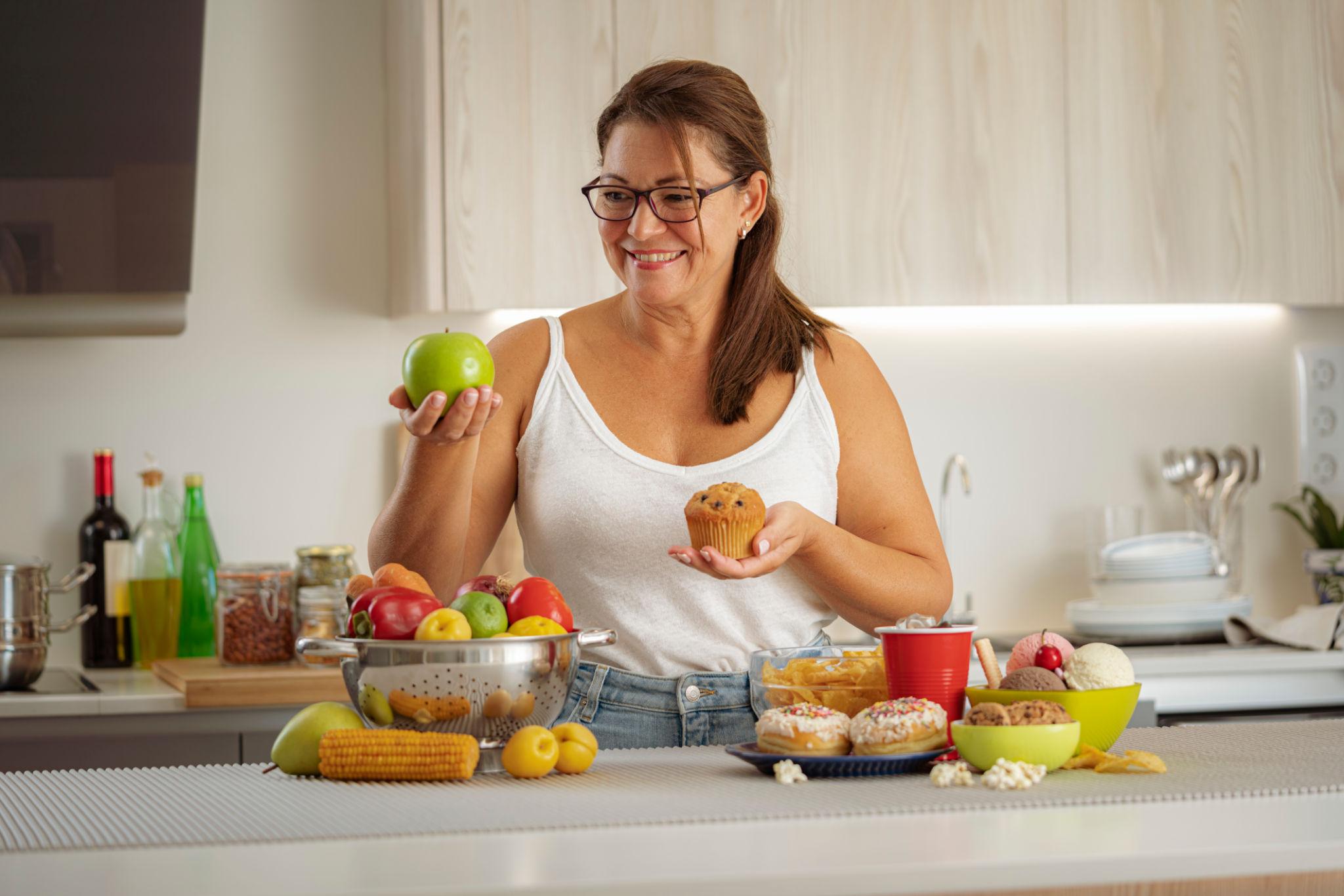 midlife woman embracing healthy food habits