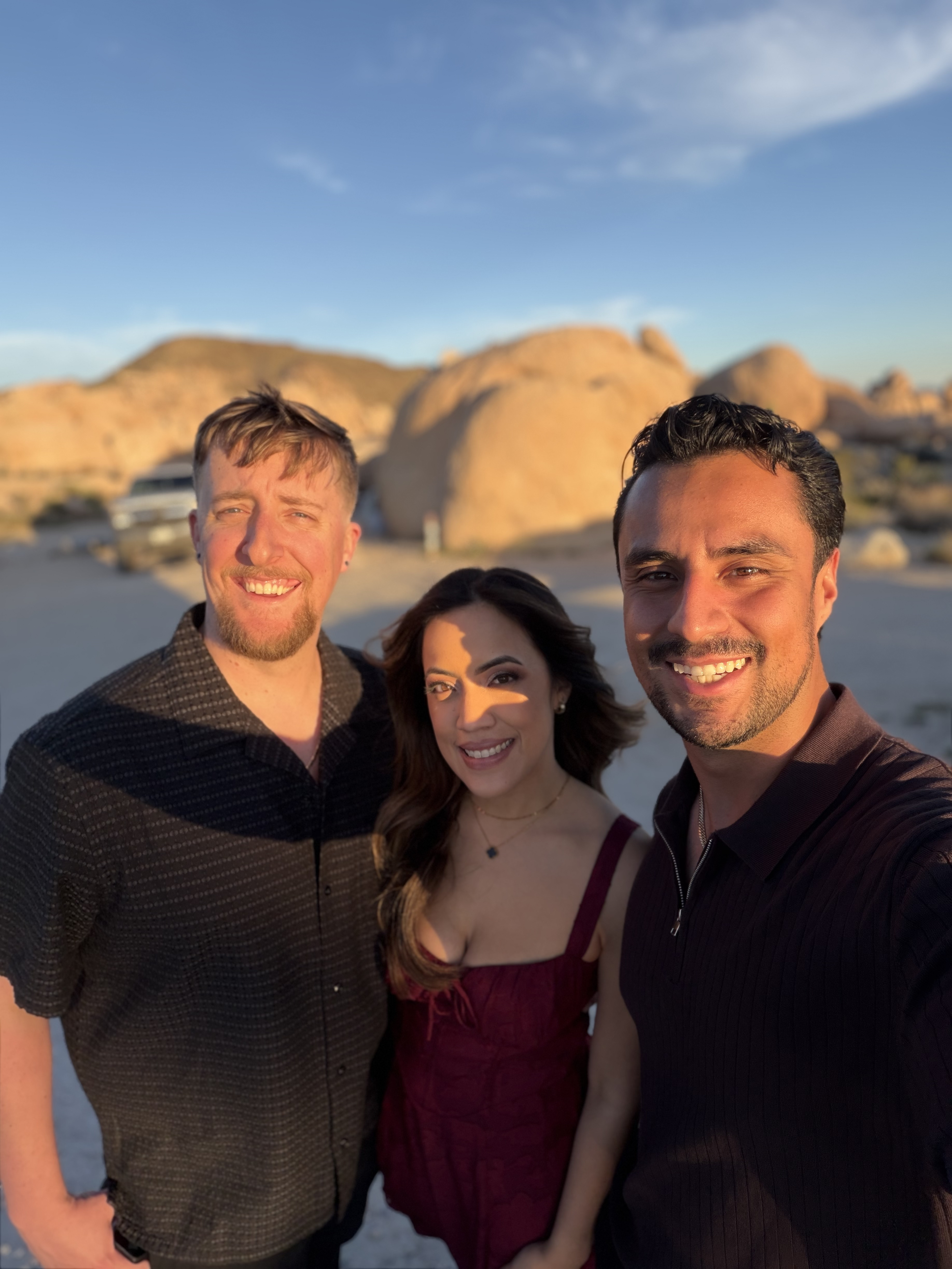 Aram with a couple at golden hour