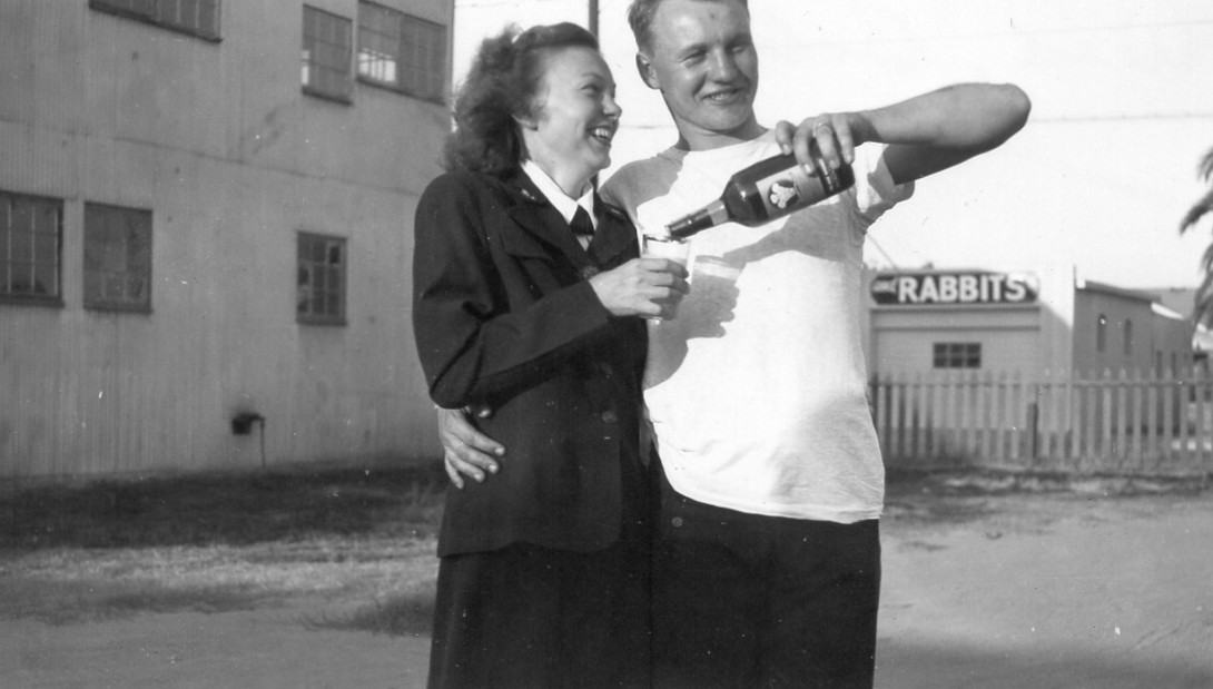 Historic black-and-white photo of the author’s grandparents celebrating VJ Day in 1945 after the end of World War II.
