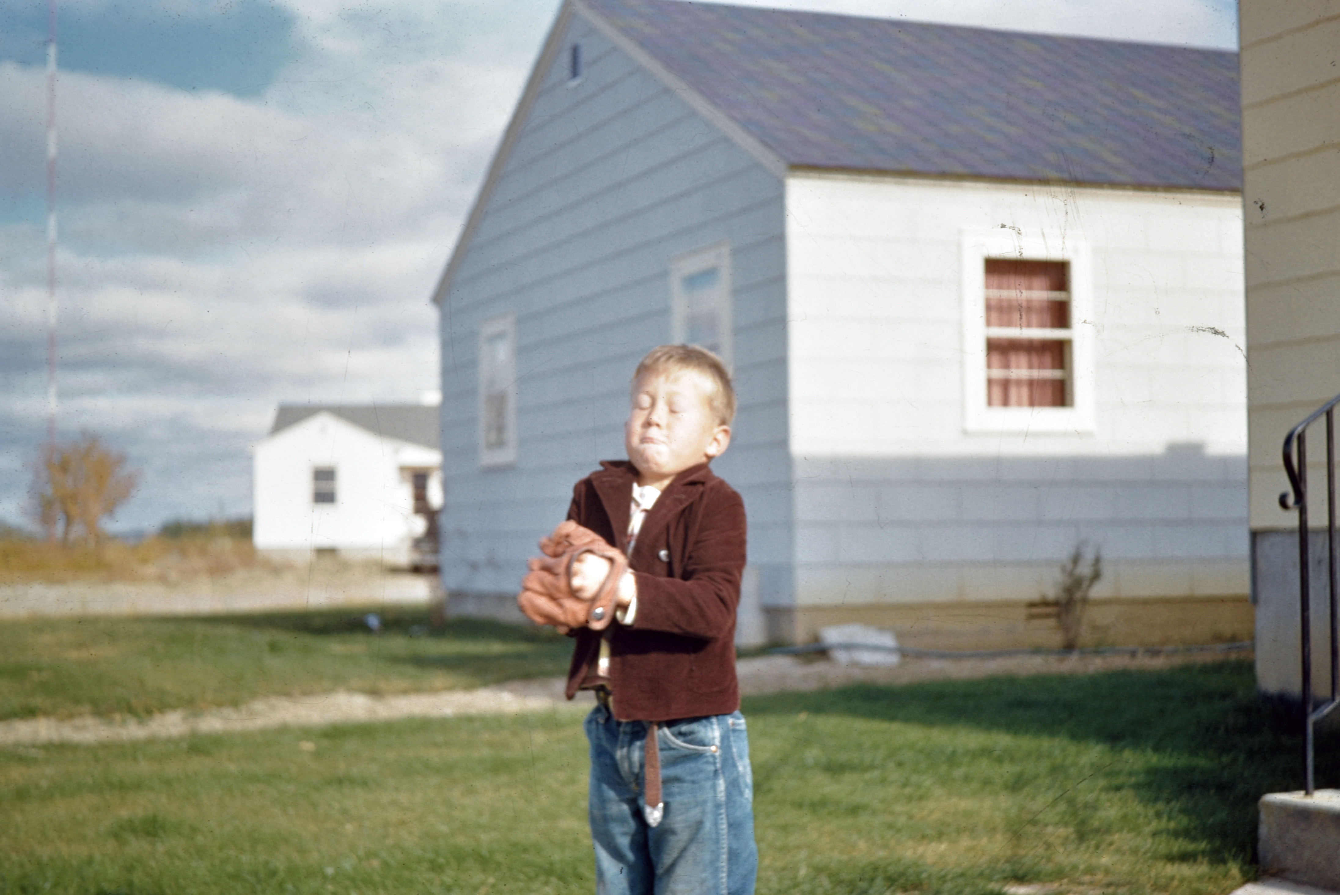 Childhood photo of my dad catching a baseball, an example of why preserving family stories with photos matters. Childhood photo of my dad catching a baseball, an example of why preserving family stories with photos matters.
