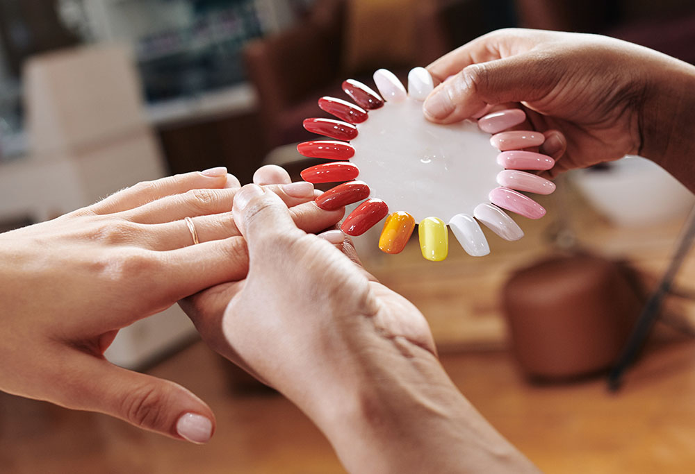An AI Agent for a nail salon answers calls while you help your clients