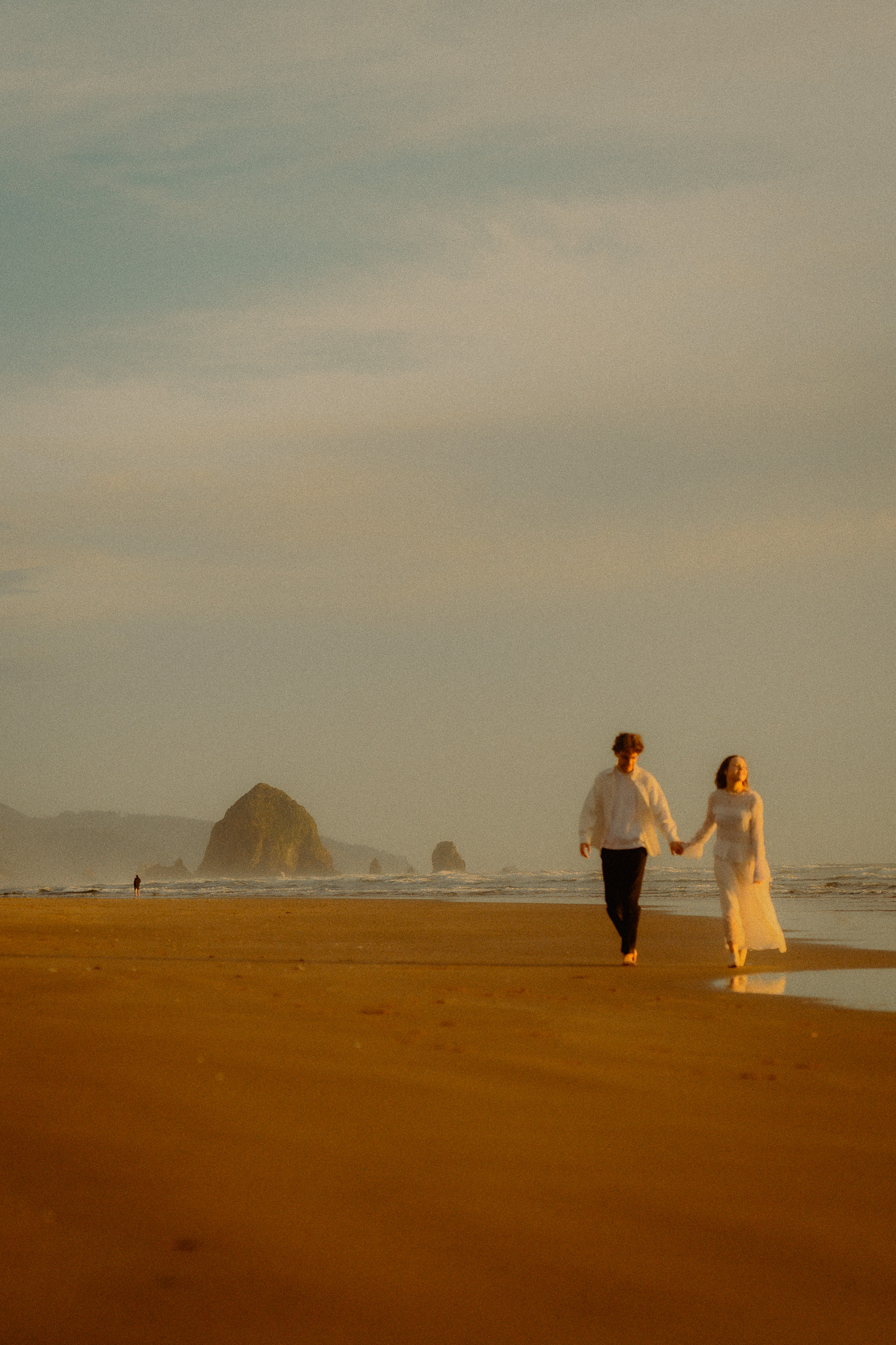 Mark and Sofia walking together at golden hour