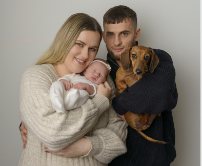 Family with their baby and dog