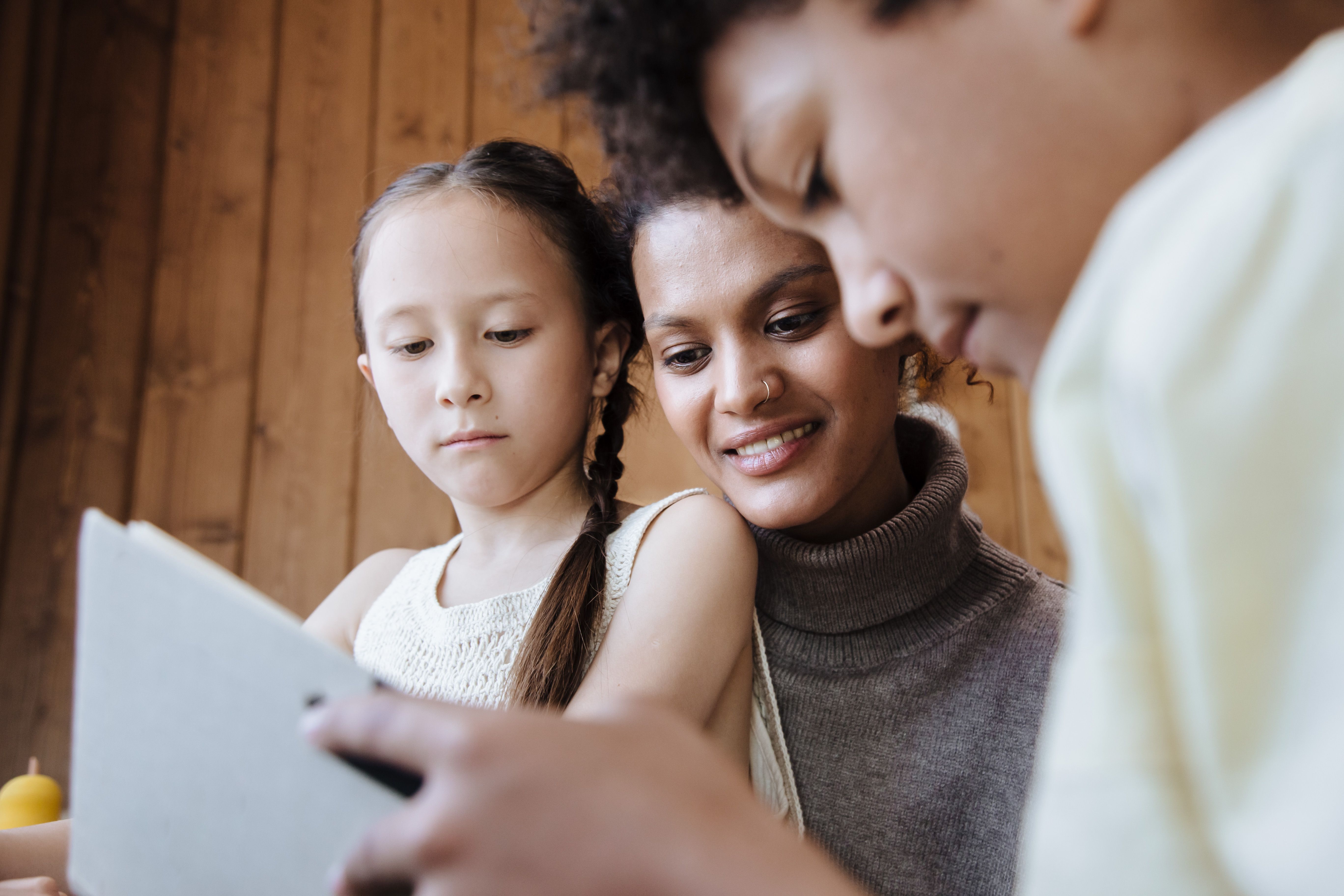 Mother teaching child about honesty, integrity, responsibility, and Christian character during a meaningful conversation at home. Mother teaching child about honesty, integrity, responsibility, and Christian character during a meaningful conversation at home.