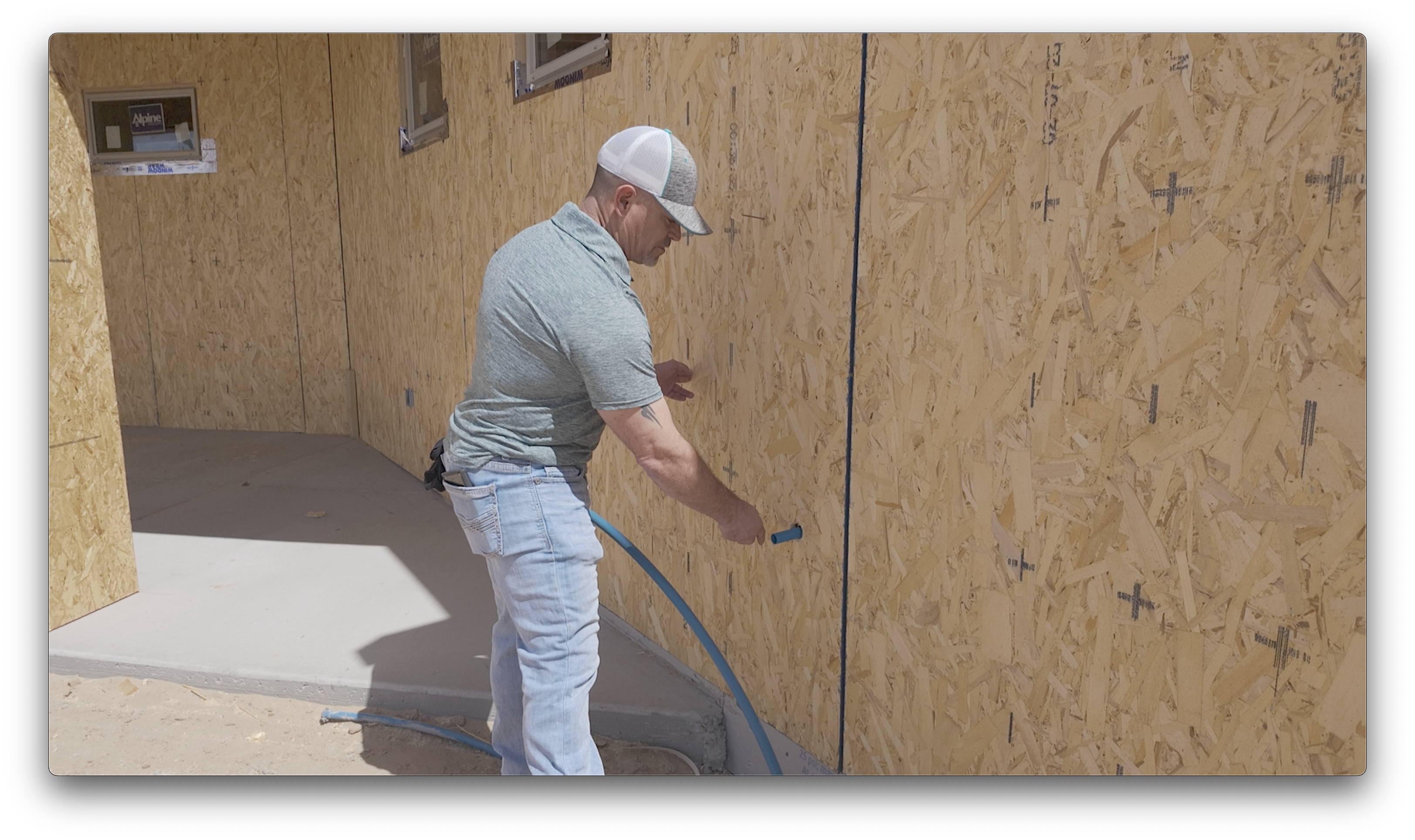 Working along the exterior sheathing of a new build