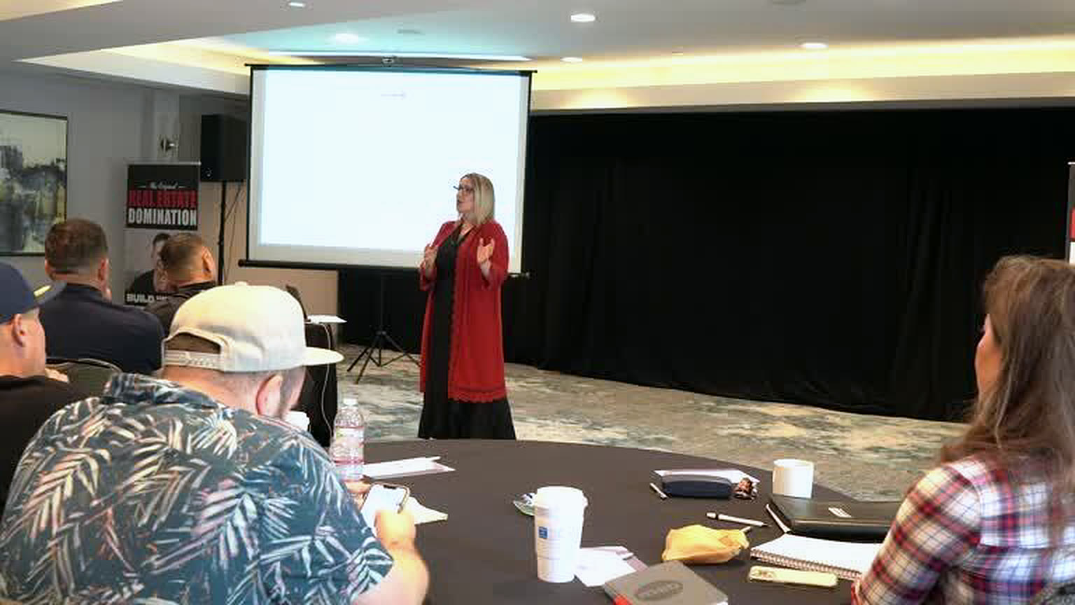 Teaching session in progress with the room seated