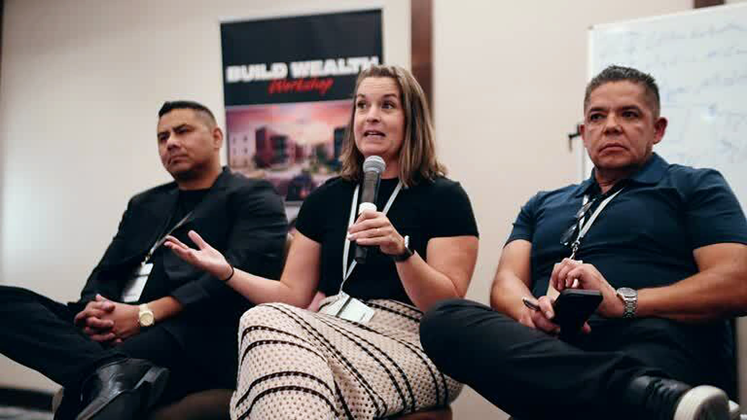 Panel answering questions at the Build Wealth workshop