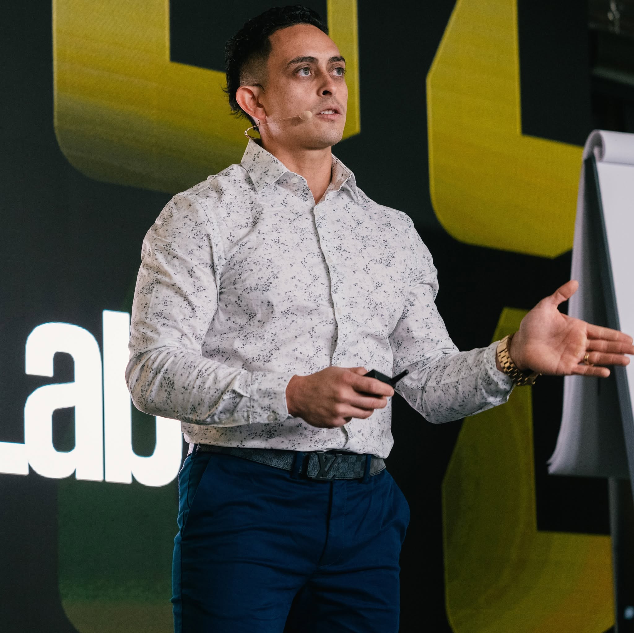 Jonathan Montoya speaking on stage