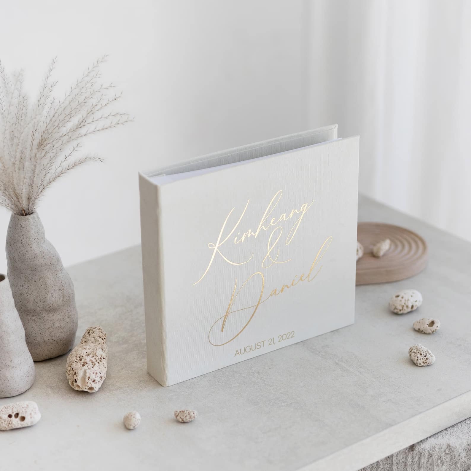 Custom wedding guest book with the couple's names and date, a PhoBoCo keepsake