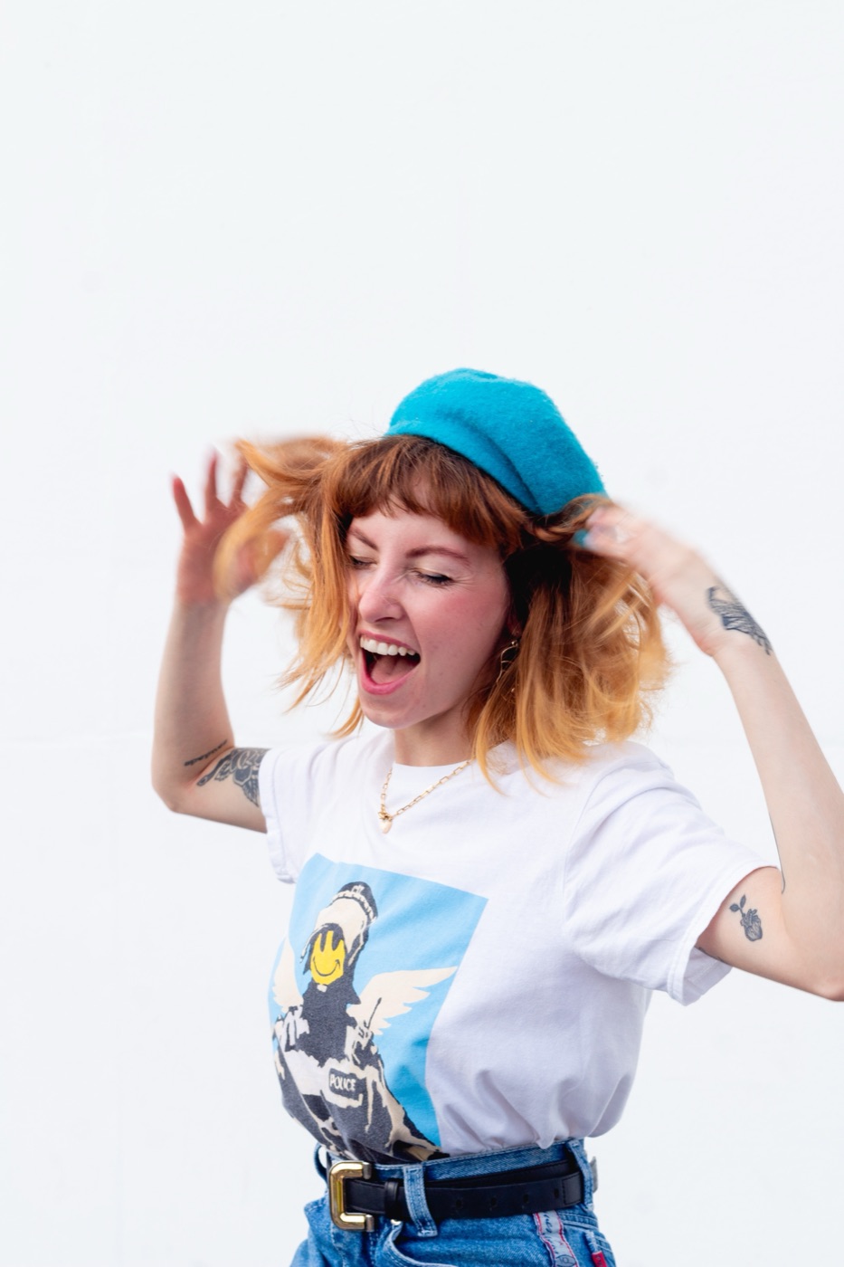 Guest laughing with hair flying mid-photo