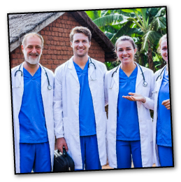 Team of doctors supported by Little People of Africa Foundation providing medical aid in an African village.