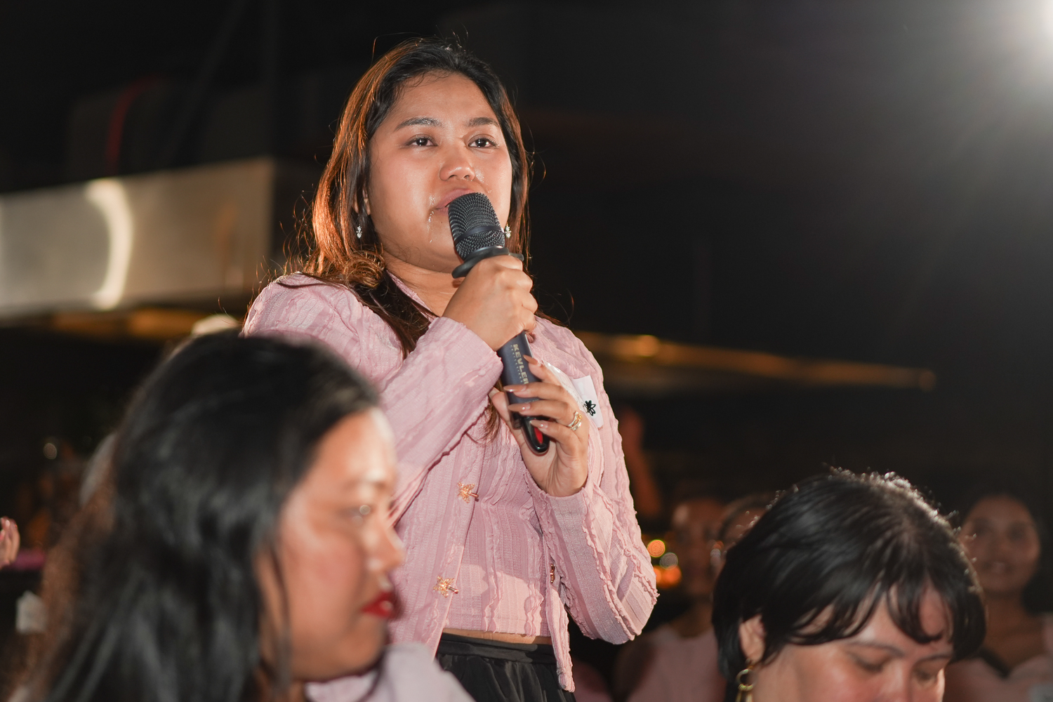 An attendee speaking into the microphone