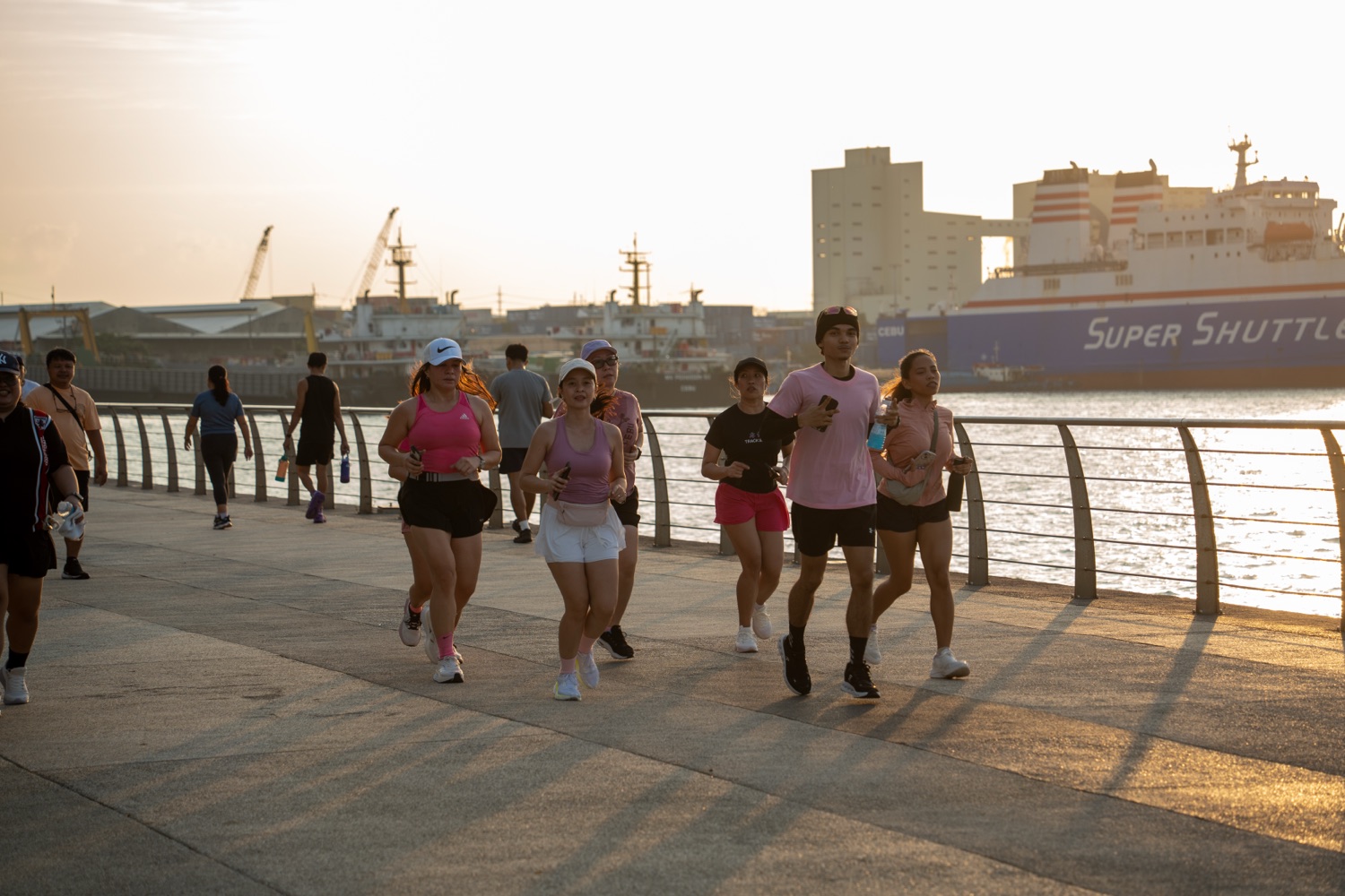 The group running together in the morning light