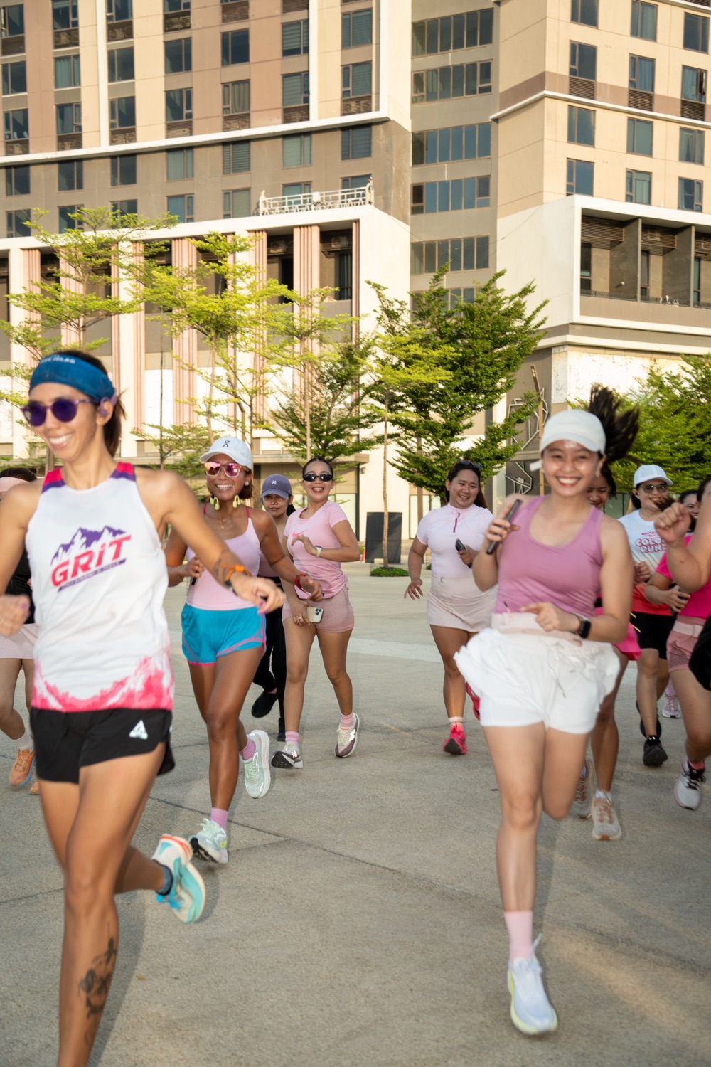 The group running together through the plaza