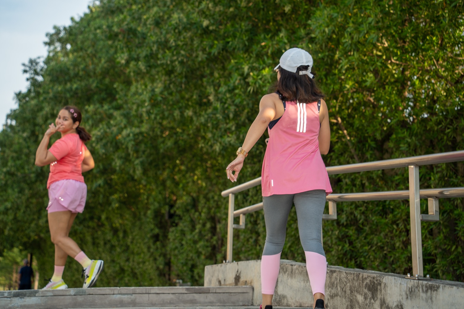 Two members climbing the stairs together