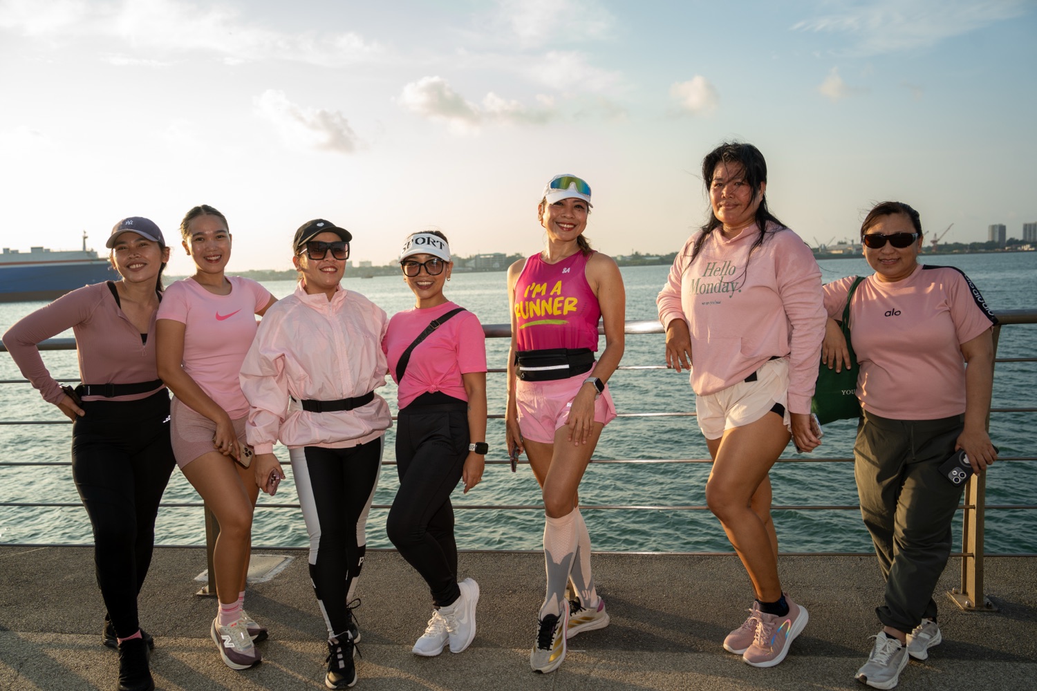 The group standing together by the water