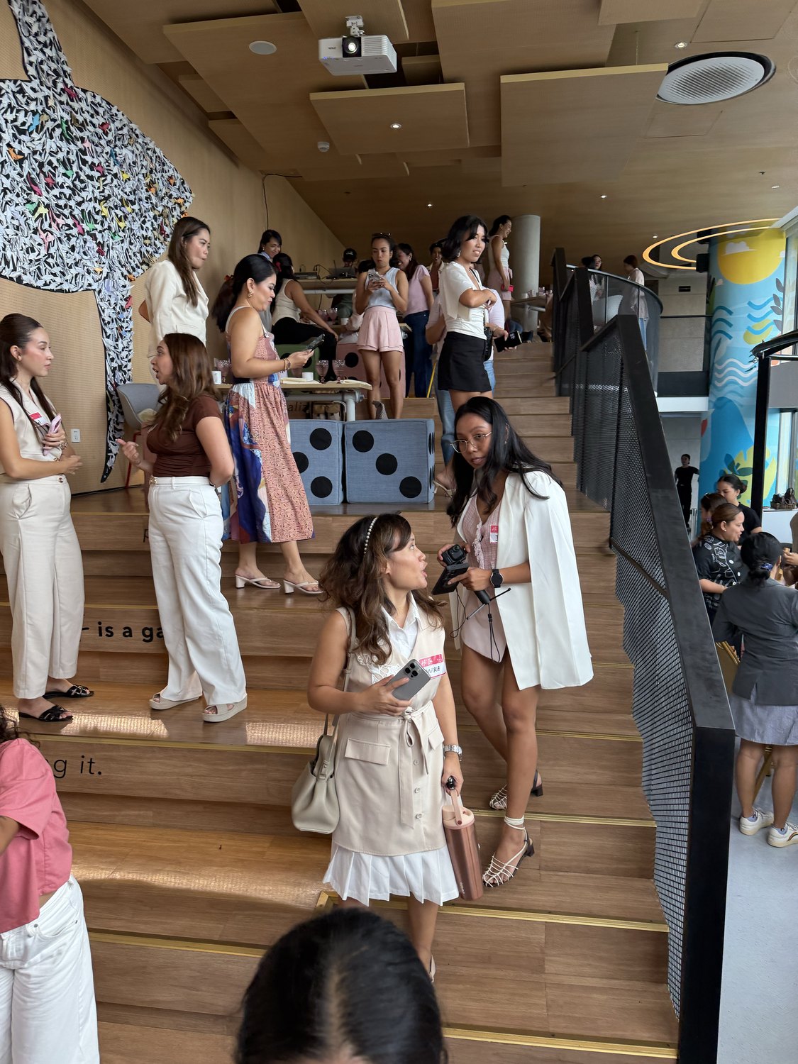 Guests arriving down the stairs into the Breakfast Club room