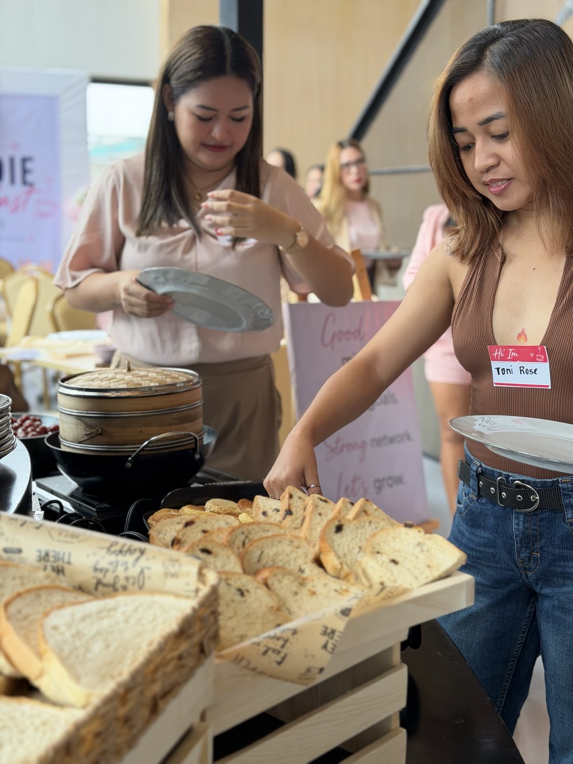 Guests serving themselves at the breakfast buffet