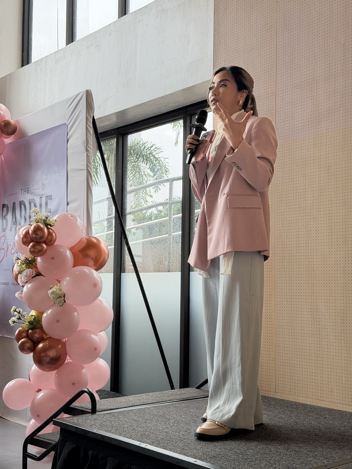 The host opening the morning on stage
