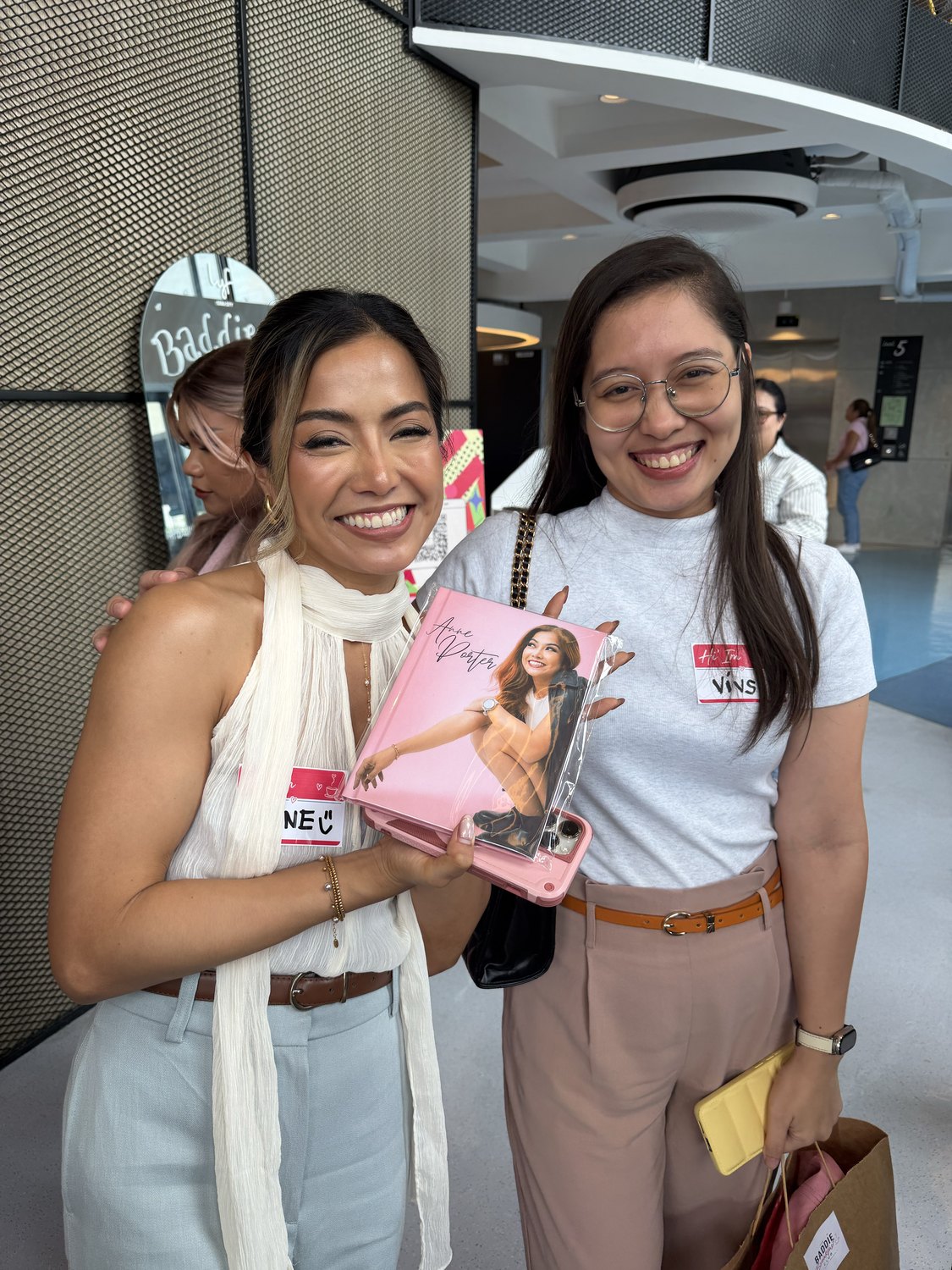 Two prize winners laughing at Baddie Breakfast Club