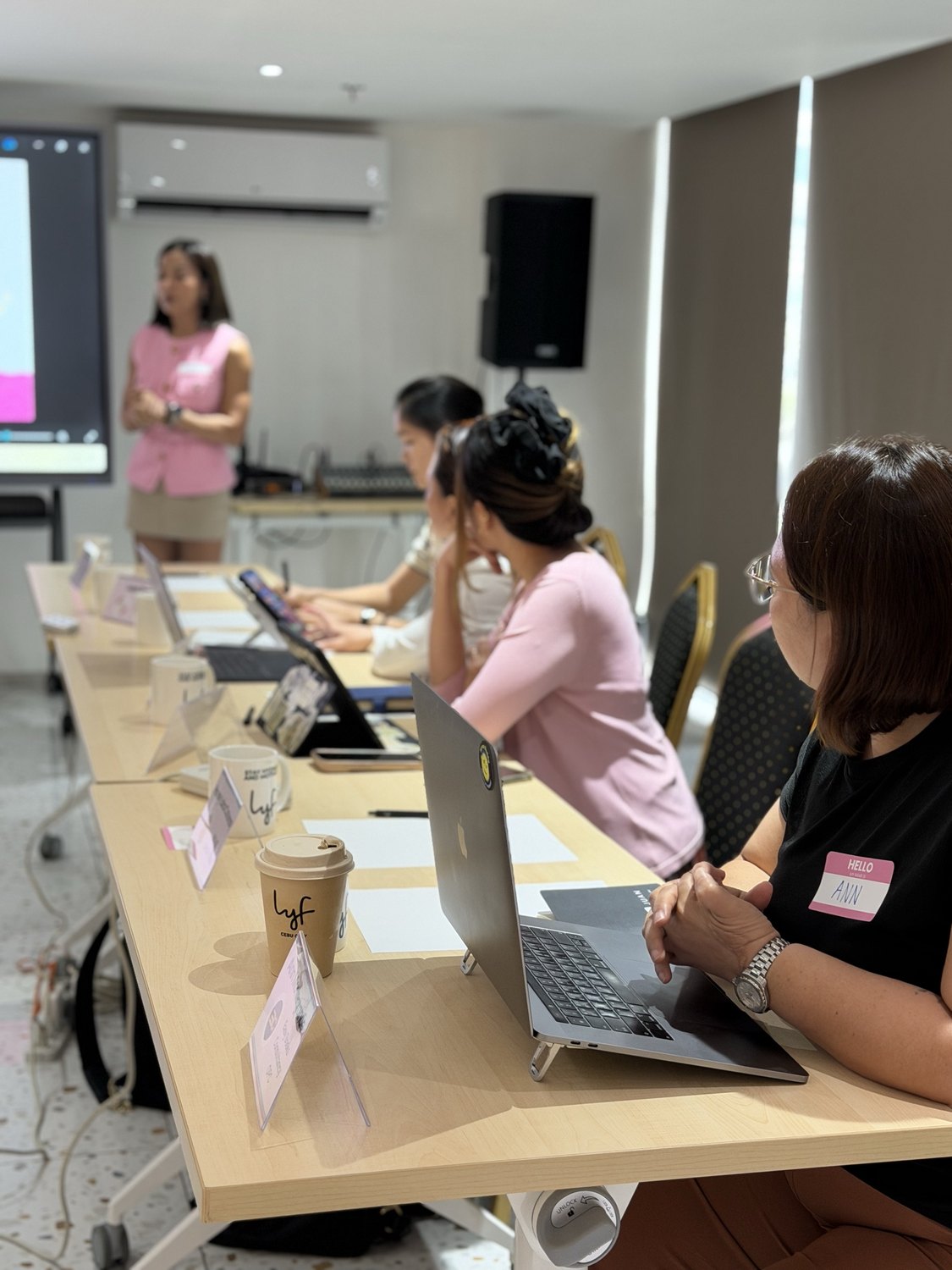 Founders taking notes at the cohort table