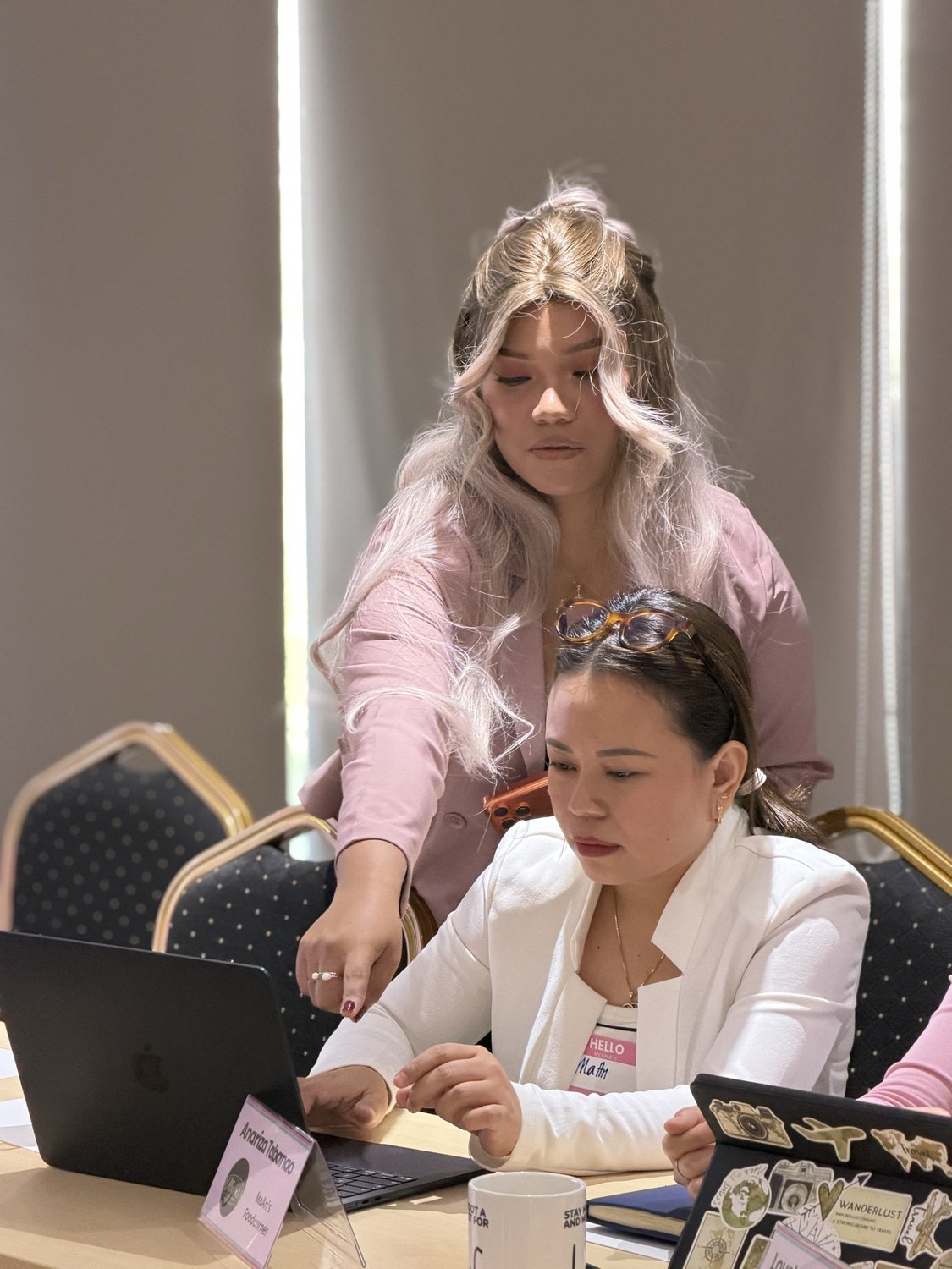 A facilitator coaching a founder one to one at Built to 5X