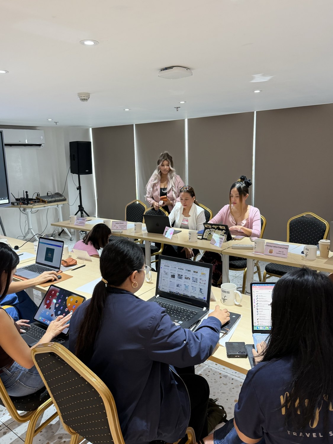 Founders working through the session on their laptops