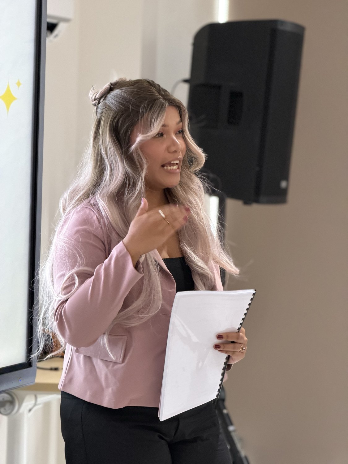 A facilitator speaking during the brand session