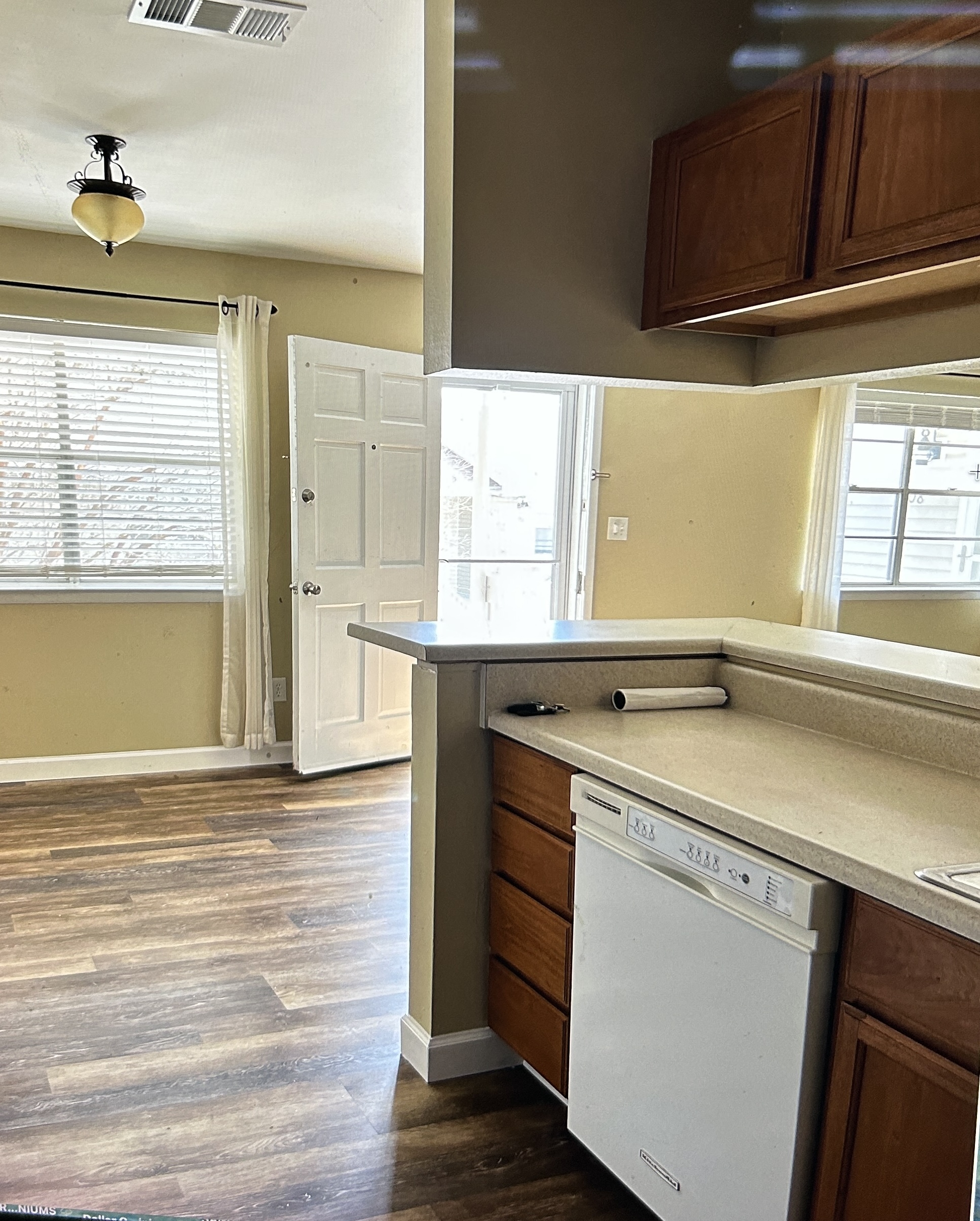 Dining area beside the kitchen bar and window