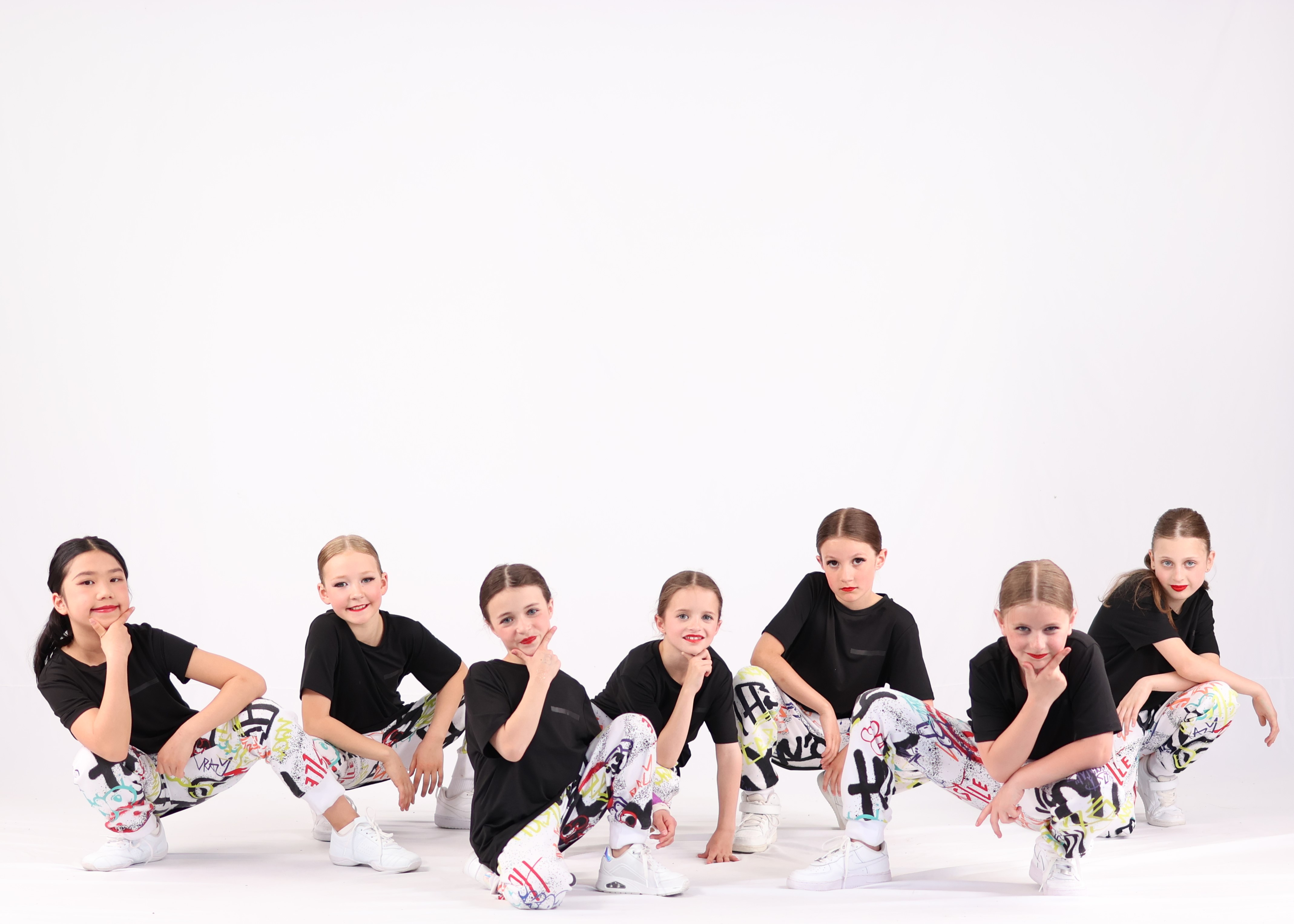 Students preparing for dance recital photos at Revolution Dance Calgary
