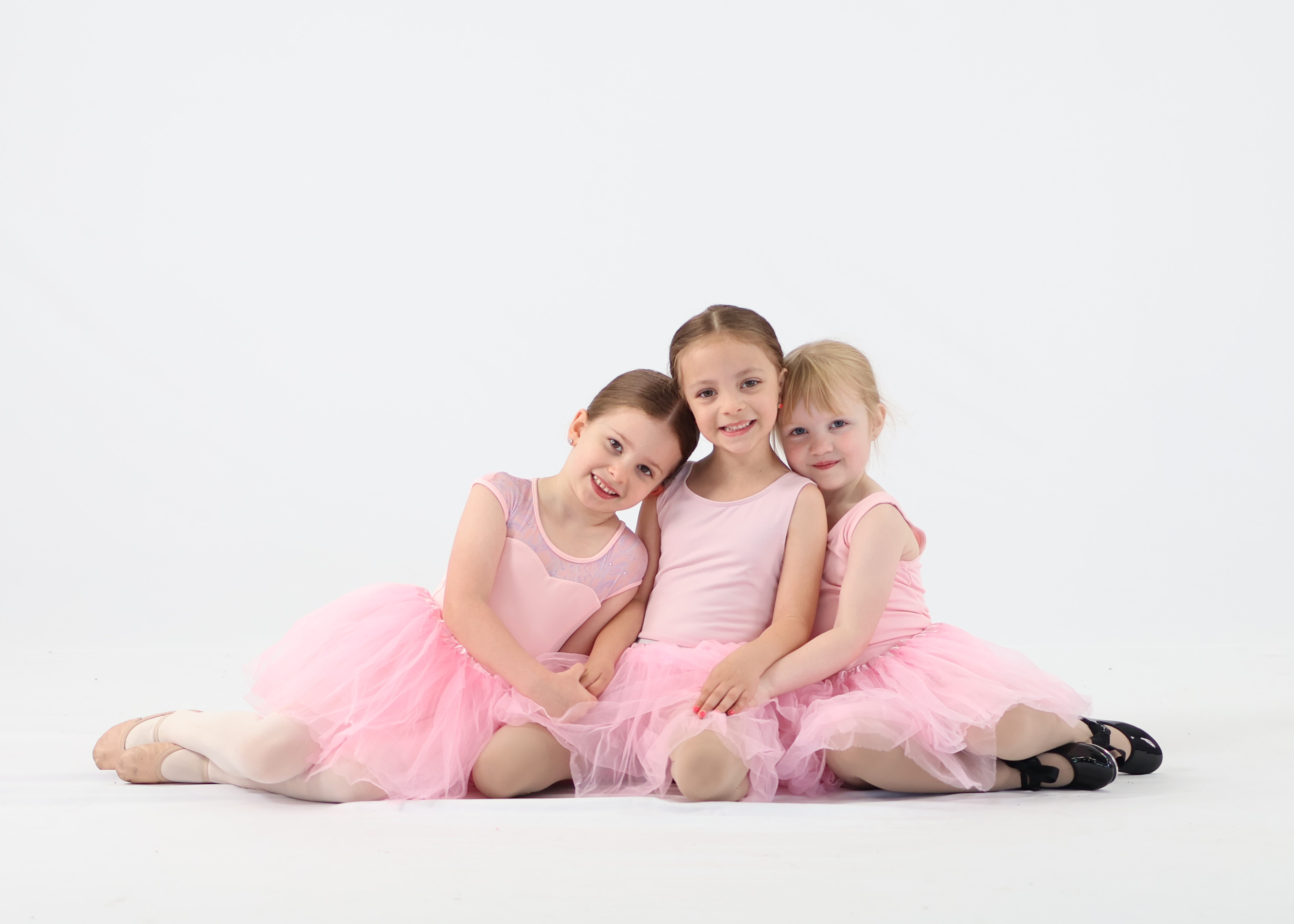 Ballet class posing for recital photo at Revolution Dance Calgar