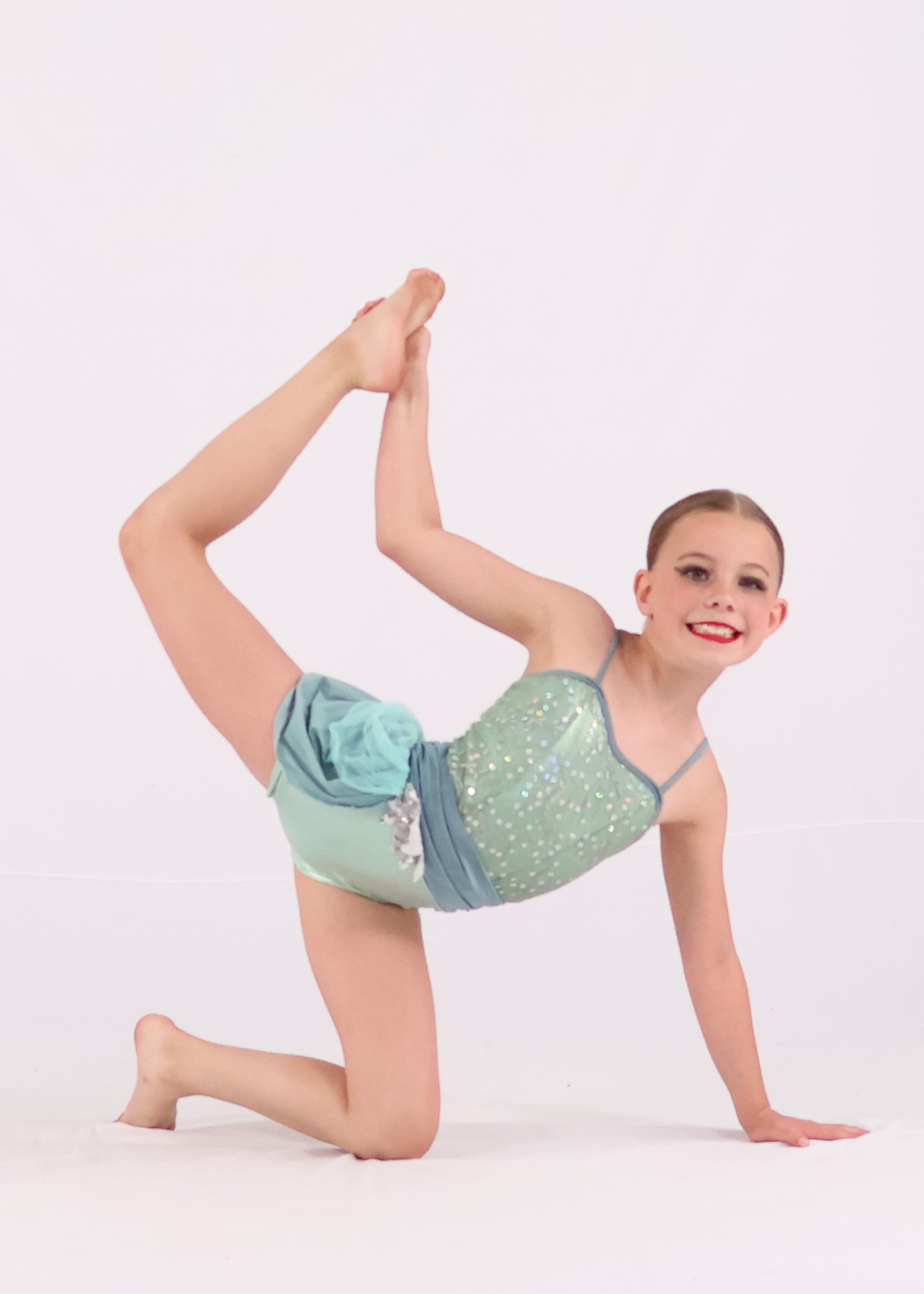 Acro dancers showing skills during year end recital picture week