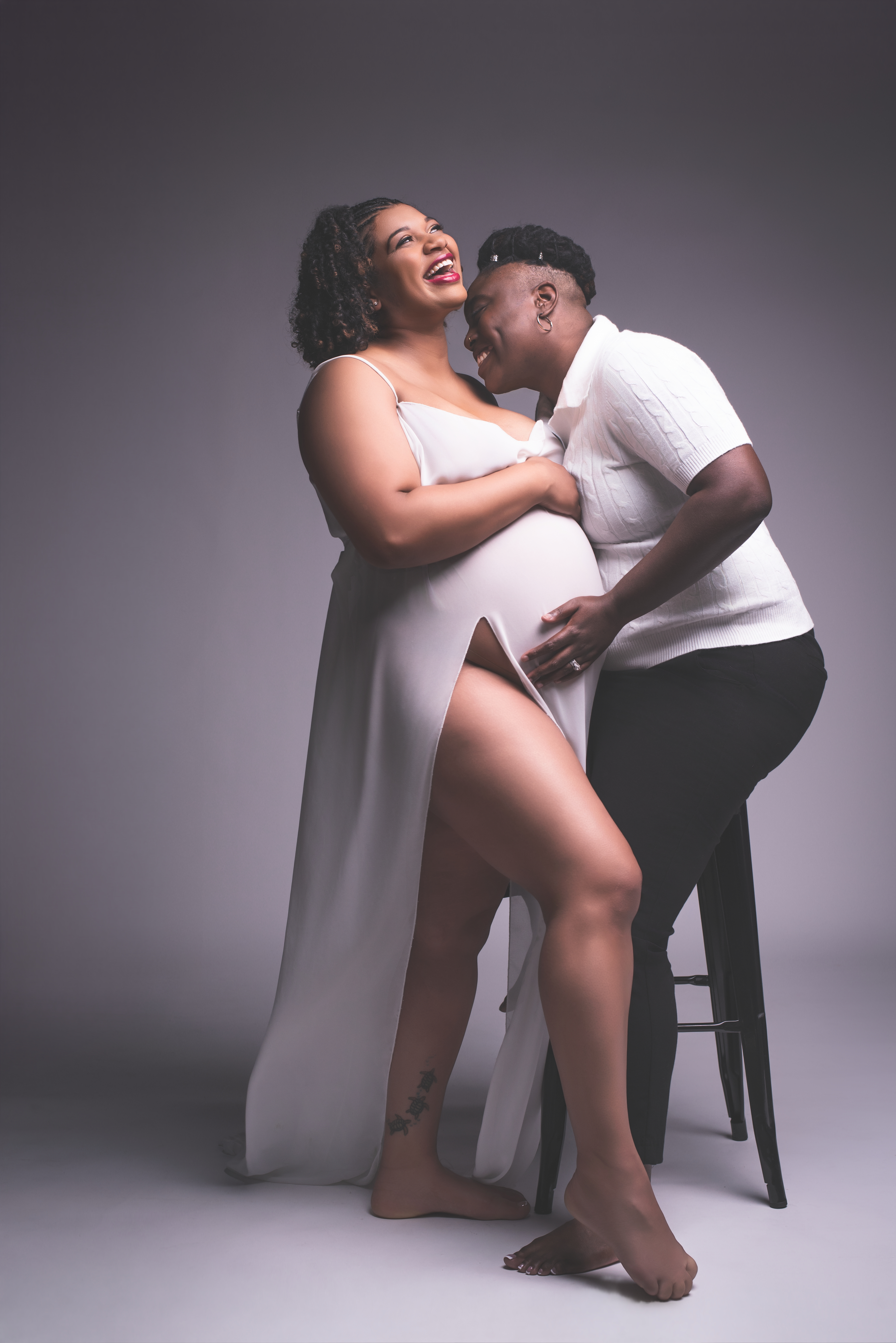 Lesbian Couples In a Maternity Shoot in Atlanta Georgia On a high fashion style set