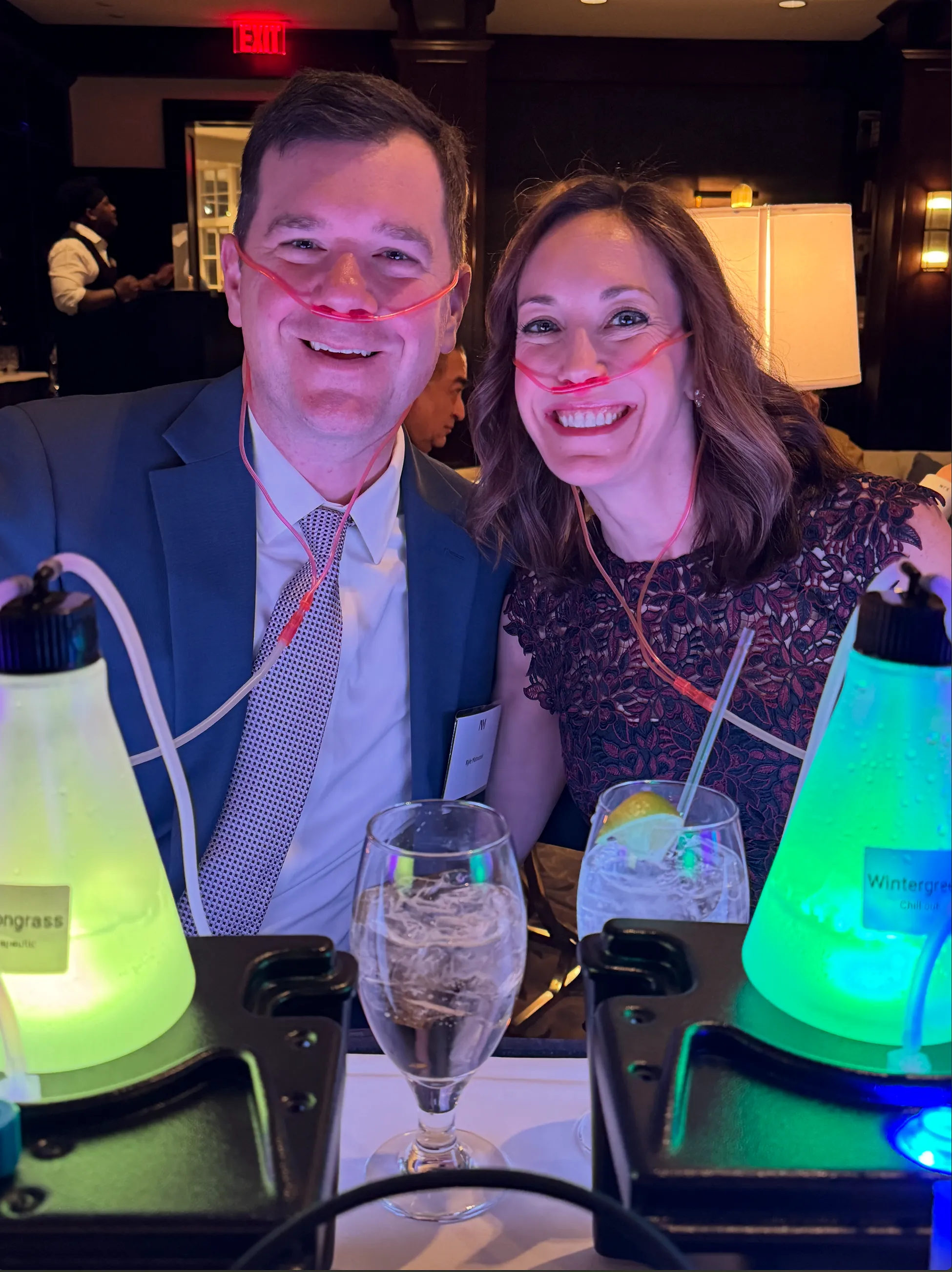 Guests using the OxygenBar360 oxygen bar at a wellness event