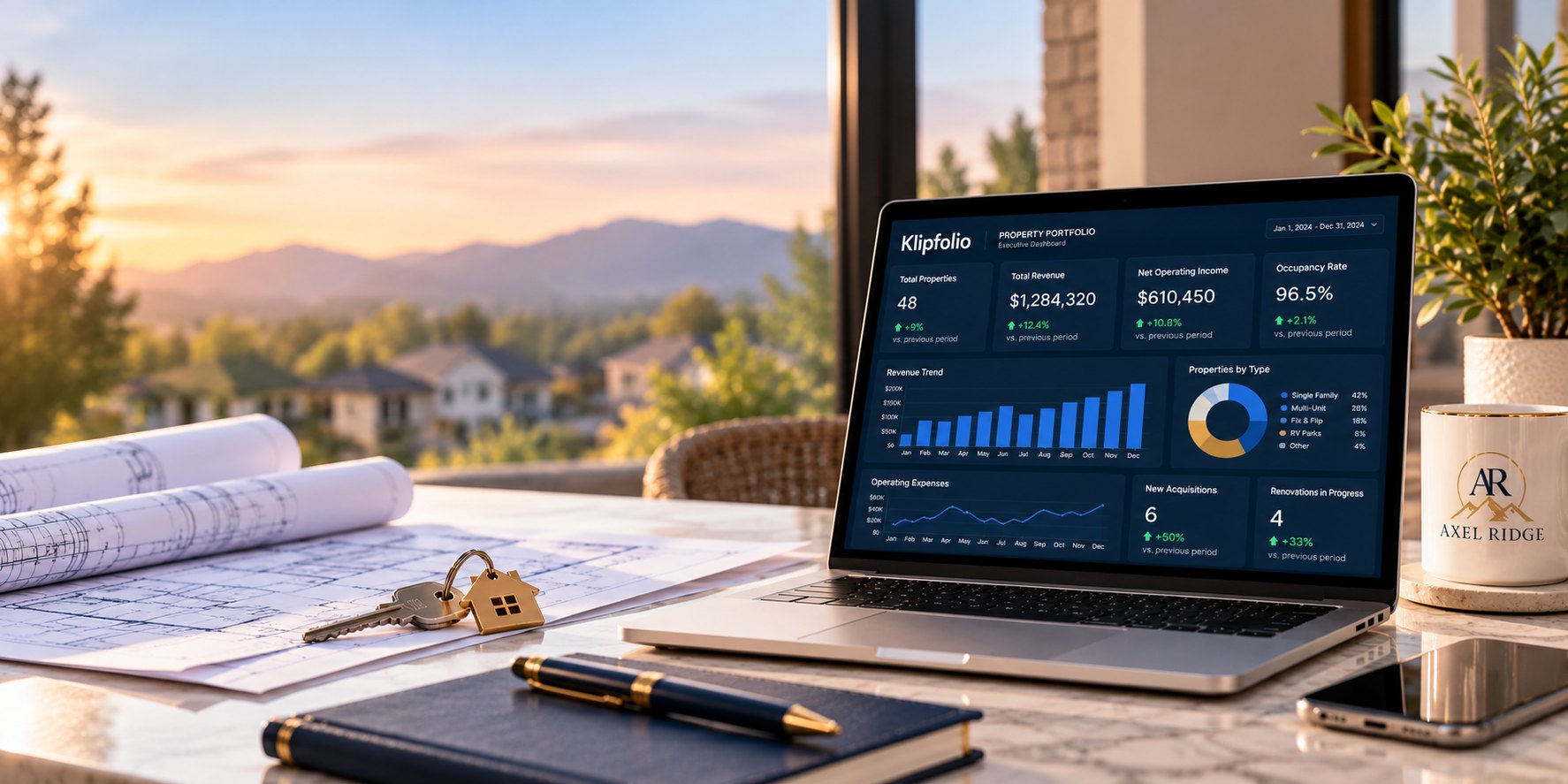 A property portfolio dashboard on a laptop beside house keys, blueprints and an Axel Ridge mug