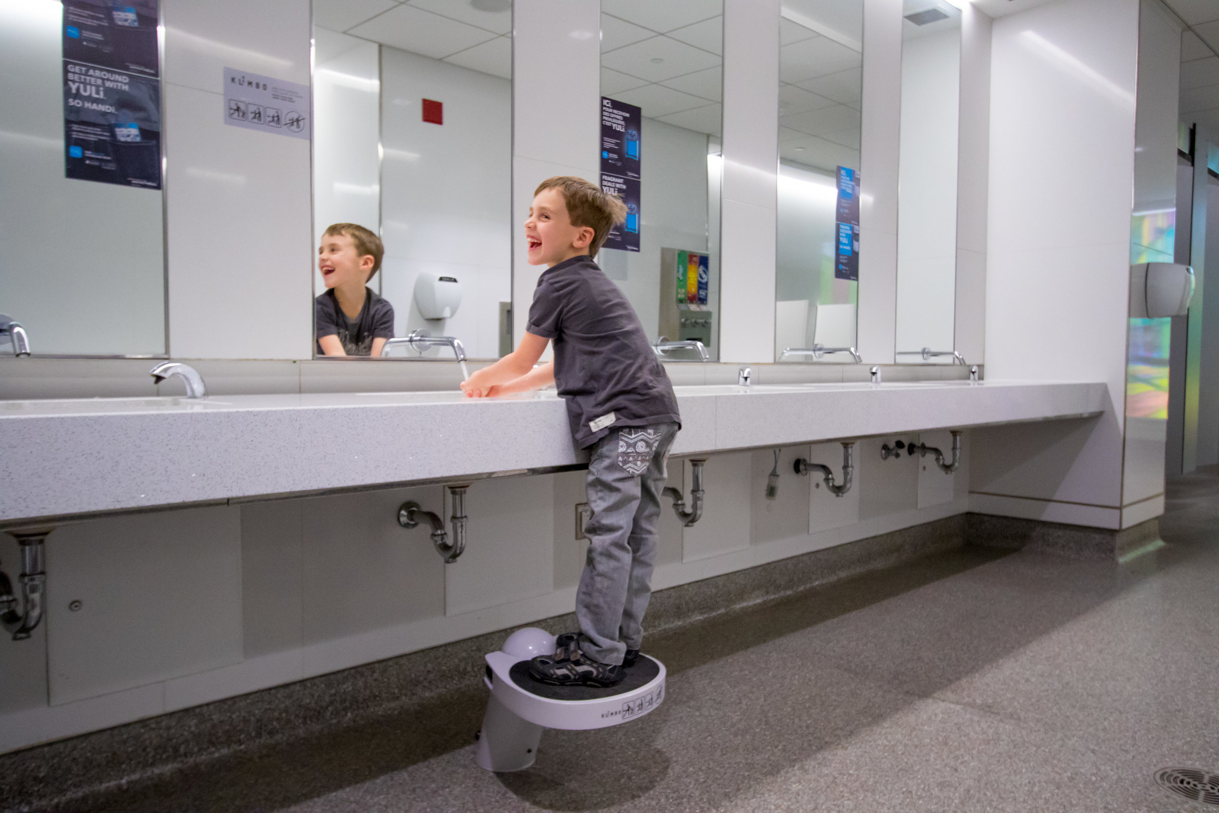 Child on a Klimbo K01 at Montréal-Trudeau airport