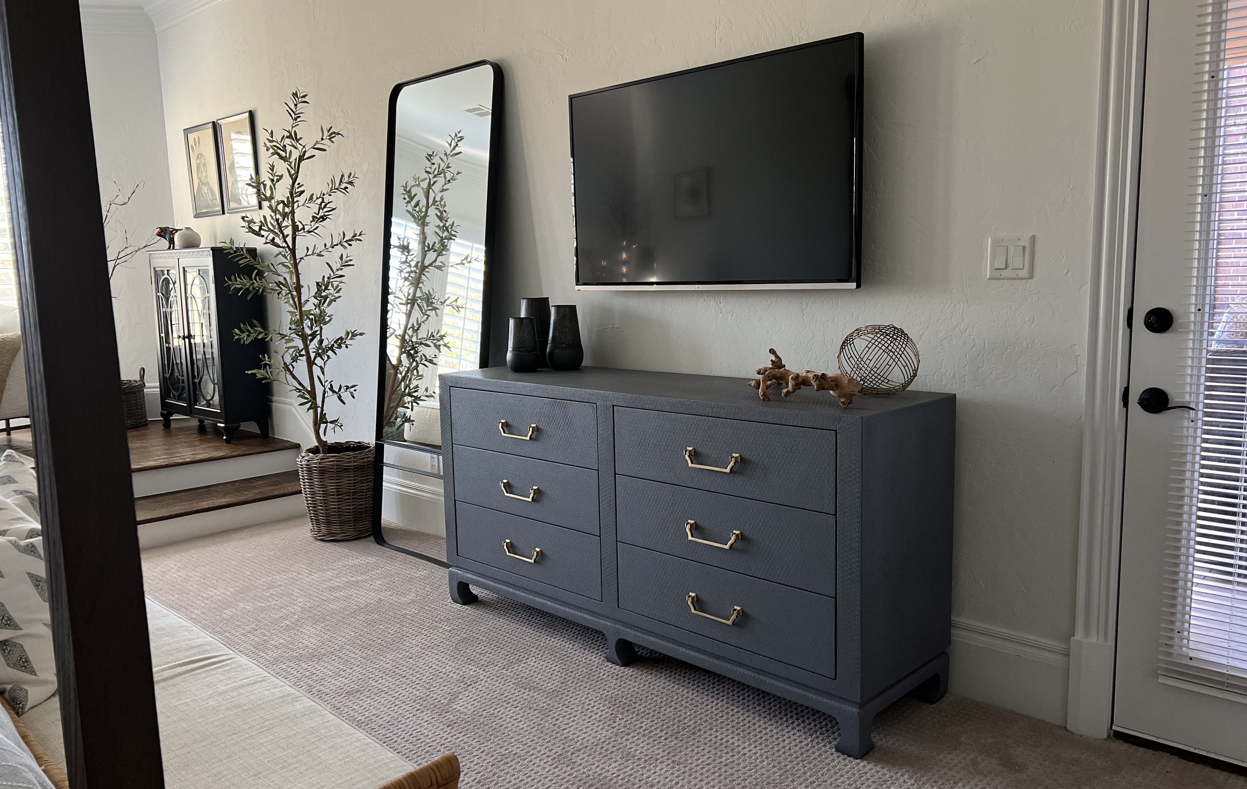 Wall-mounted TV with surround sound
