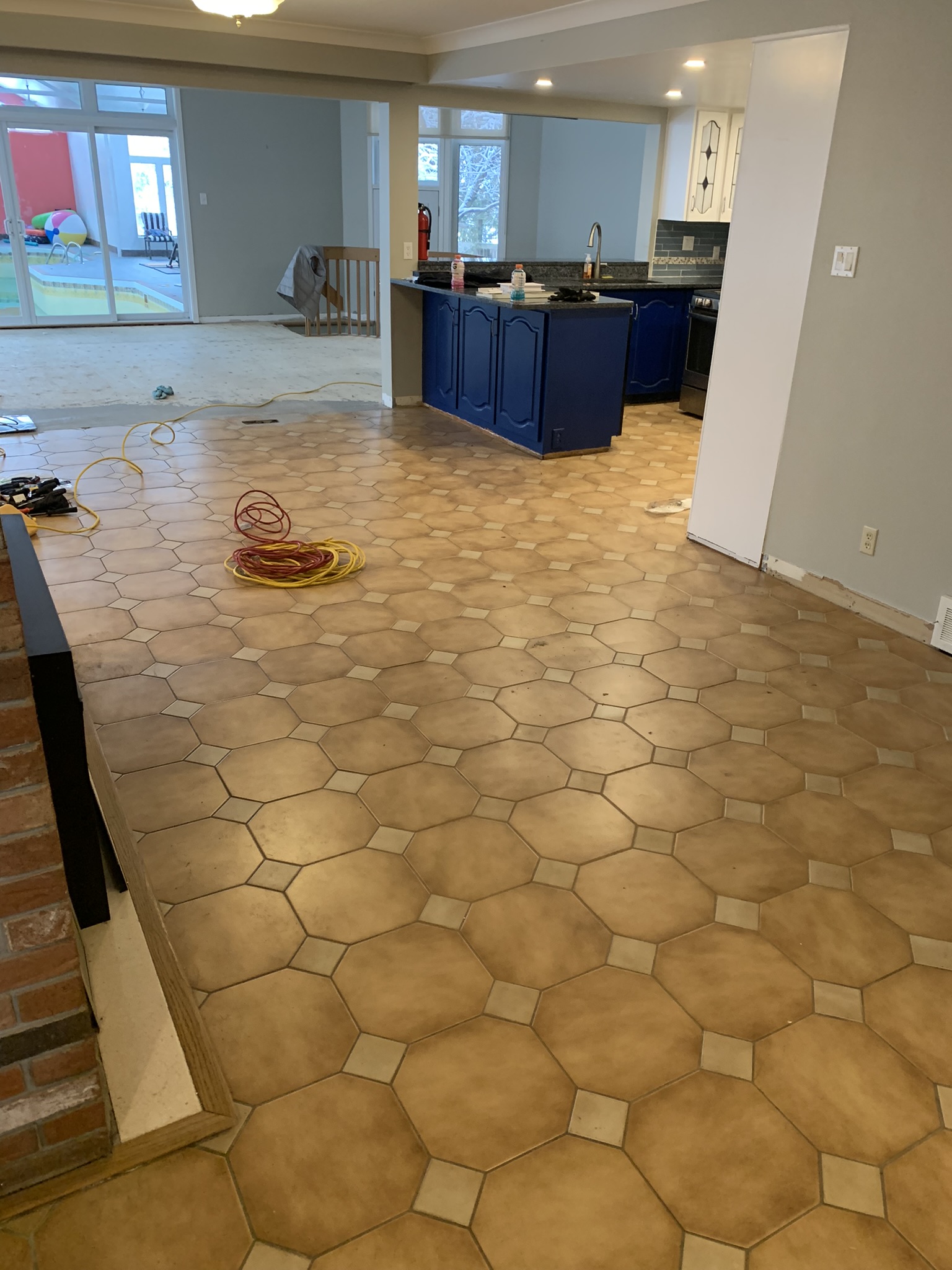 Kitchen tile to metallic epoxy before