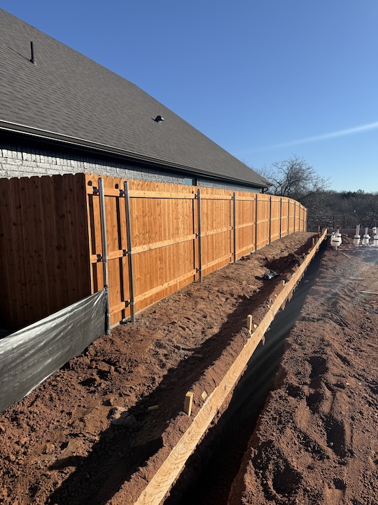 Wood privacy fence installation by Fence Craft Oklahoma in Piedmond