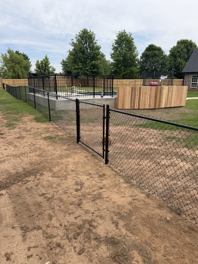 Galvanized chain link fence installation by Fence Craft Oklahoma