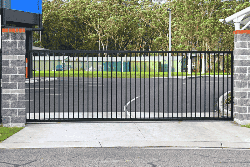 Commercial automatic slide gate installation by Fence Craft Oklahoma